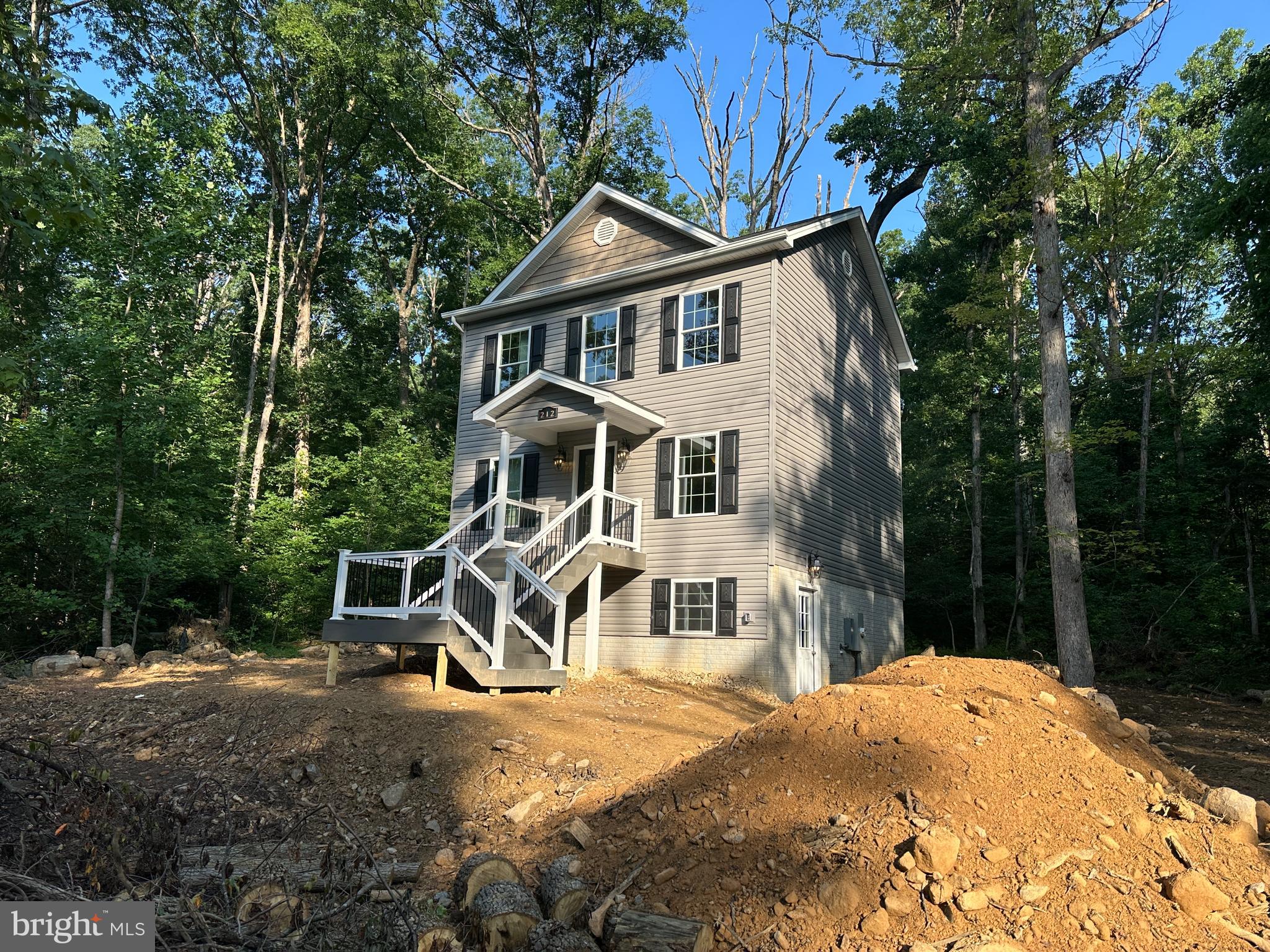 Nearing completion!  
1/3 Acre – No Carpet!
This affordable 2-bed, 2.5-bath home offers high-end finishes and incredible growth potential.
Premium Finishes: Hardwood floors throughout (including all bedrooms), tile in all baths, and granite kitchen countertops.
Open Layout: Bright family room and a spacious kitchen/dining area perfect for entertaining.
Owner’s Suite: Large master bedroom with a dedicated walk-in closet and a "true" master bath with double sinks.
Expansion Ready: The basement is already roughed-in for a future bath and features a radon vent pipe, offering a path to nearly double your living space (up to 1,728 sq. ft.).
Don't miss out on this opportunity—contact us for more details!
Xfinity available.