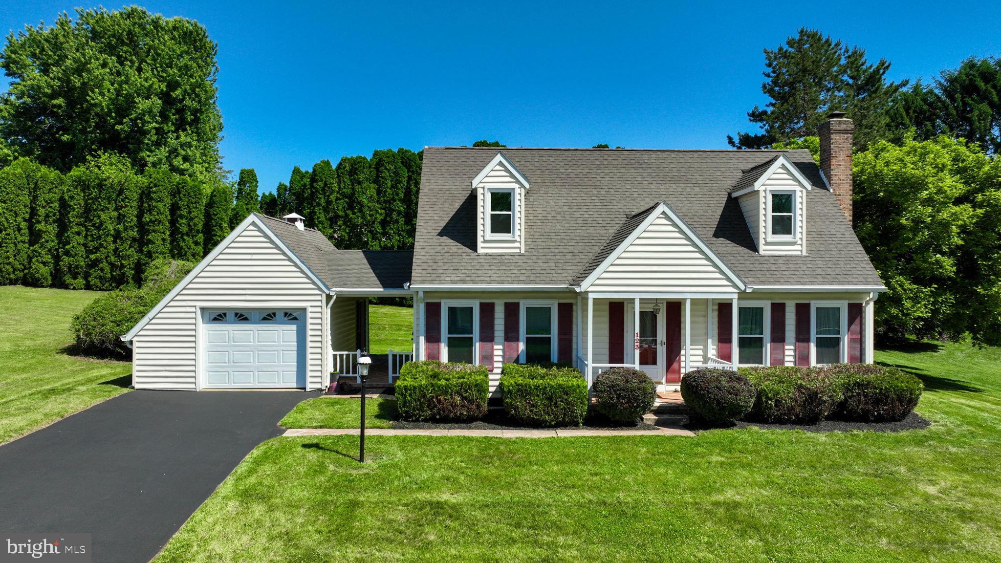 Check out this move-in ready home in Southern York County situated on a beautiful tree-lined lot with an oversized garage. Enjoy the ease of first-floor living with a spacious primary bedroom featuring a walk-in closet and private access to the full bath. Featuring a bright and open layout with updated luxury vinyl plank flooring throughout the main living areas. The spacious living room is highlighted by a cozy fireplace and flows seamlessly into the dining area — creating an ideal space for everyday living and entertaining. The eat-in kitchen offers direct access to the expansive rear deck, perfect for outdoor gatherings. A convenient laundry room is located just off the kitchen. The upper level includes two additional bedrooms and a second full bath providing plenty of space for family or guests. Outside, the breezeway connects the home to the oversized garage while the large rear deck overlooks the peaceful backyard setting. Conveniently located just minutes from restaurants, shopping, and local amenities with easy access to I-83 and Maryland for commuters.