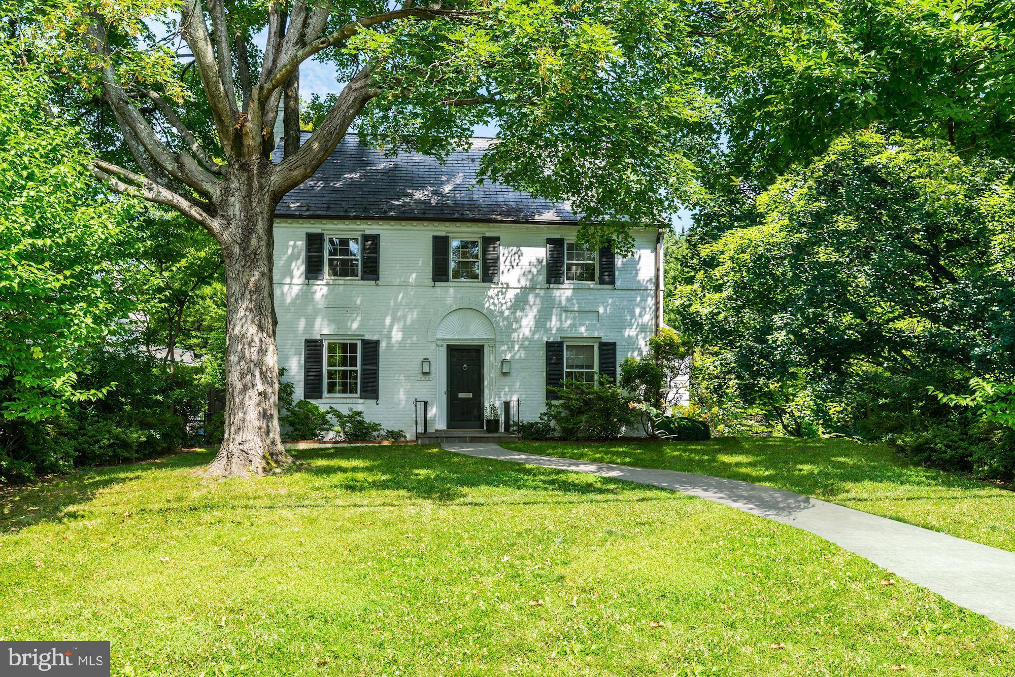 Picturesque perfection in this 5/6 Bedroom 4 1/2 Bath beautifully updated Colonial.  A gracious street presence welcomes you to 4 floors of expansive inviting rooms including a delightful Living Room with fireplace, handsome formal Dining Room, exceptional Family Room with custom built-ins and stunning gourmet Kitchen,all recently highlighted in Home & Design Magazine.  A wall of windows surrounds the Breakfast Room off Kitchen overlooking landscaped yard.  Upstairs the large Master Bedroom has cathedral ceiling, His/Her closets and gorgeous updated full Bath.  There are 3 additional Family Bedrooms and 2 full Baths. A finished 3rd Floor is amazing space with skylights for the Bedroom/Office/Playroom with built-ins and storage.  Lower Level has a  Bedroom/Office/Bonus Room and new full Bath, Laundry, Storage.   Outside there is a lush fenced yard, flagstone patio for family and entertaining.  Detached Garage.    Located just minutes from a pool club, several parks, Crescent Trail, the shopping, dining, Metro at Friendship Heights, Spring Valley and minutes to Bethesda, this is a dream come true for comfortable family living and warm entertaining.
