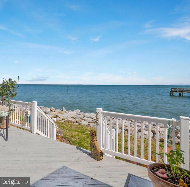 LIVE the SALT LIFE Year round or Make this your Vacation Get Away! GREAT Walk-a-bility! Enjoy all the Twin Beaches have to offer * Public Beaches * Boardwalks * Fantastic Restaurants * Shopping * Rod N Reel Resort * Casinos/Slots * Marinas * Rich History * FANTASTIC SCHOOLS * Easy Commute to DC * Baltimore * Annapolis * JT Base Andrews *  A rarity to find a home for Sale in this Neighborhood! Gorgeous END-UNIT WATERFRONT TOWN HOME * GREAT VIEWS * EACH Bedroom has it's OWN FULL En-suite Bathroom * 2 Bedrooms have Bay Views * 3rd Level is Versitle and can be 3rd Bedroom, Studio, Office, Flex Space * Granite Counters * Bright Kitchen * Separate Dining Area * REAL Hard-Wood Floors throughout HOME * Propane Ventless Fireplace * Just Steps to the Private Sea Gate Community Fishing Pier * UPDATES Include:  Hot Water Heater 2024 * Gas/Electric Range 2021 * New Windows 2018 w/ Transferrable Warranty* Refrigerator and Dishwasher 2018 * HVAC 2017 * HARD WOOD Floors 2017 * Washer/Dryer 2017 * New Roof 2016 * Electric Retractable Awning for Bayside Deck Area *