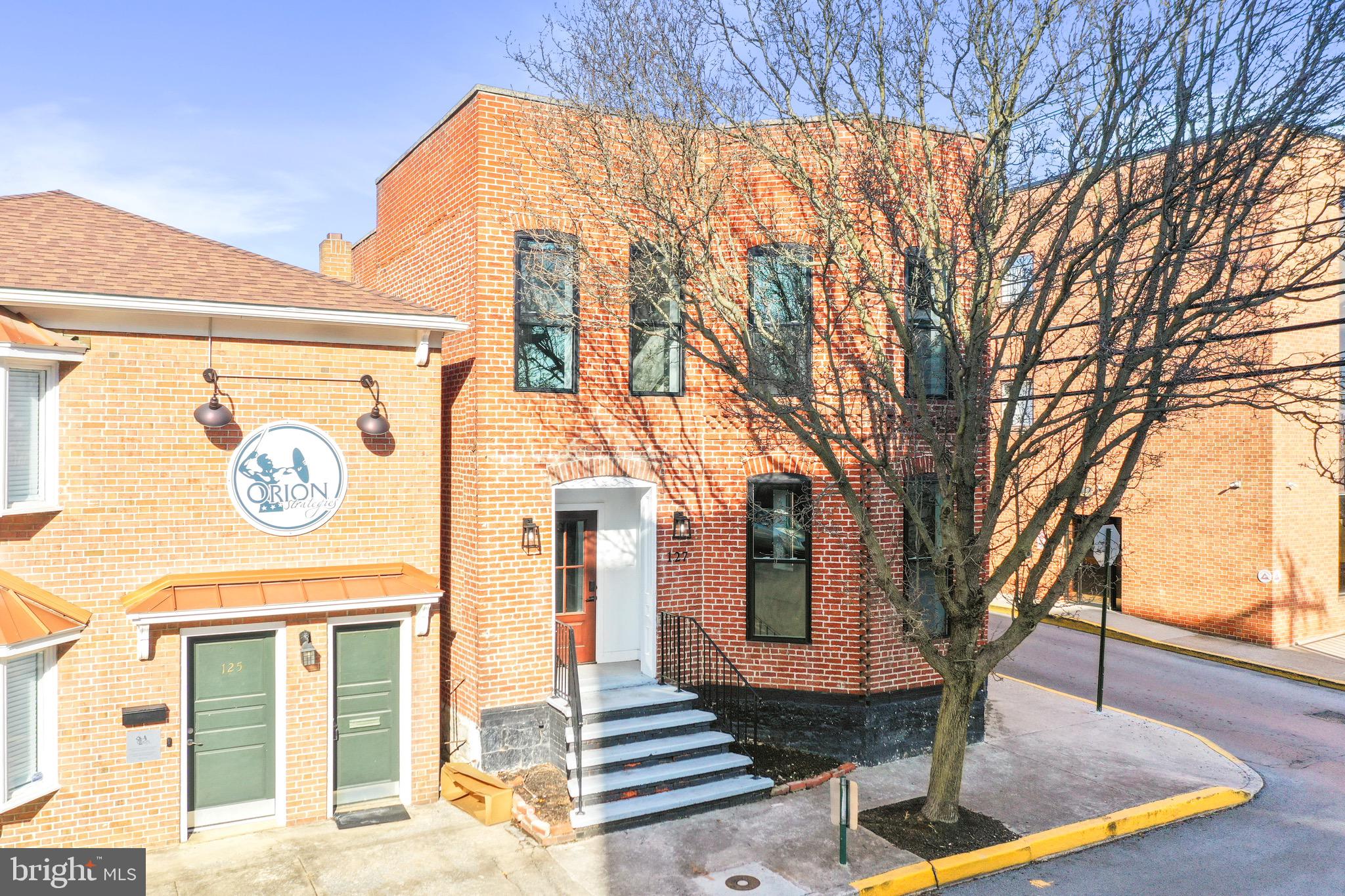 PRIME OFFICE/RETAIL SPACE AVAILABLE! 5,400 Square Foot of Beautifully Renovated Space, in the Heart of Downtown Martinsburg! This central location makes easy access to Interstate 81, Route 11, Route 9, Route 45, and Main Street Martinsburg. This newly remodeled building features high ceilings with large windows and natural light throughout, freshly painted interior, and new low maintenance flooring throughout. Two floors of space with the upper level separated into offices, and the lower consisting of two very large spaces. The owner is open to separating space, and allowing additional build out for customizing the space for tenants needs. Call For Additional Info & Your Private Viewing Today!