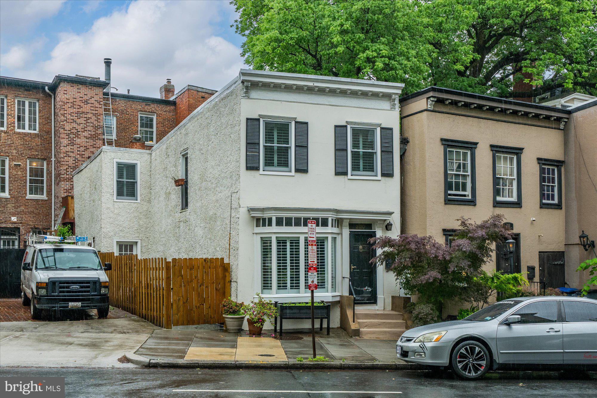 Welcome to 2120 Florida Avenue NW—a beautifully appointed two-bedroom, two-and-a-half-bath residence available for rent in the heart of Washington, DC’s sought-after Dupont neighborhood. This elegant home blends classic architectural charm with tasteful modern updates, offering the perfect combination of comfort, style, and convenience.

Step inside to find a spacious, light-filled main level with hardwood floors, tall ceilings, and generous living and dining areas ideal for both relaxing and entertaining. The updated kitchen features stainless steel appliances, granite countertops, and ample storage, opening out to a private rear patio—perfect for outdoor dining or enjoying a quiet morning coffee.

Upstairs, you’ll find two large bedrooms, each with its own en-suite bath, providing privacy and flexibility for roommates or guests. A convenient half bath is located on the main floor, along with in-unit laundry for added ease.

Located on a tree-lined block just steps from Dupont Circle, Rock Creek Park, and the city’s best dining, shopping, and Metro access, this home offers exceptional walkability and access to all that DC has to offer.

Available now—2120 Florida Ave NW is the ideal urban retreat for those seeking a refined rental in one of the city’s most prestigious neighborhoods. Schedule your private showing today!