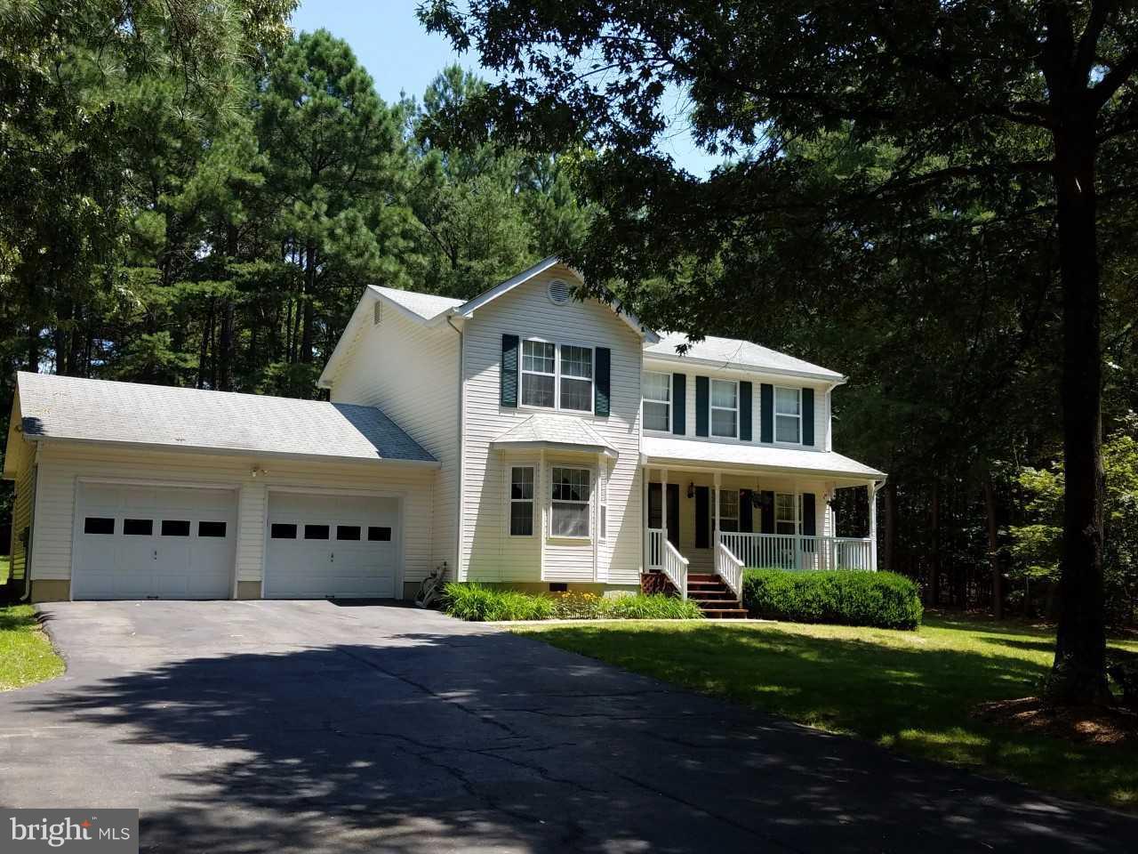 Be in your new home for the holidays!  A Well maintained home that features new paint and new carpet upstairs. The screened porch offers additional space for entertaining or a quiet place to enjoy the outdoors.  the house also offers an over-sized garage and a large shed for additional storage or  Conveniently located in central Calvert County.  This home offers easy commutes to work and shopping.