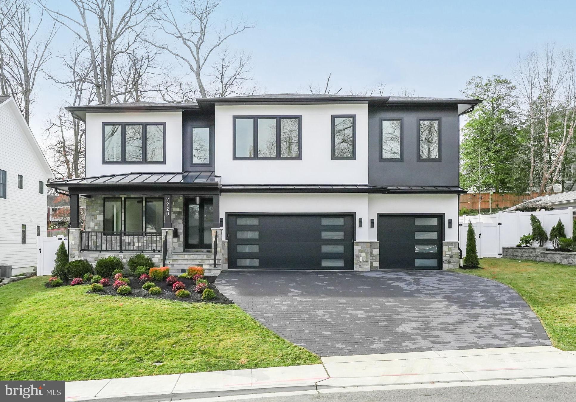 Price Improvement! Fantastic value... Don't miss seeing this incredible home on a beautiful lot and located very close to Yorktown High School!! 
Discover the epitome of luxury in this stunning newly constructed 3 car garage transitional home in North Arlington, boasting approximately 8,308 sq. ft. across three impeccably finished levels. This magnificent residence offers 8 bedrooms, 8 full baths, and a half bath, providing expansive living spaces meticulously crafted for ultimate comfort and convenience. Effortlessly navigate the home with an elevator connecting all levels and enjoy personalized climate control with a sophisticated 4-zone HVAC system.

At the heart of this home is a meticulously designed kitchen that seamlessly flows into the spacious family room, featuring an inviting electric fireplace. The kitchen is equipped with an oversized Quartz Island, dual sinks, and two dishwashers, along with a 48-inch Wolf range with 6 burners and an infrared griddle, a 48-inch Subzero refrigerator, and a supersized pantry with ample shelving, making it ideal for both entertaining and everyday living. Adjacent to the kitchen, unwind in the screened-in stone porch, offering a ceiling fan and a view of the beautifully manicured and private fenced backyard. Entertain guests in the elegant separate dining room and enjoy the convenience of working from home in the main level front bedroom/office with a full bath en-suite. Additionally, there is another bedroom next to the mudroom that can also serve as a separate office.

Upstairs, the luxurious primary suite offers a spacious bedroom with an electric fireplace, a cozy sitting area with a coffee wet bar, cabinetry, and a beverage cooler, a private balcony, and a spectacular primary bath featuring a large glass-enclosed shower, dual vanities, a soaking tub, and a separate toilet room. Additionally, this incredible home includes 4 other private ensuites and a spacious laundry room with a window, sink, and ample cabinetry.

The walk-up lower-level entertainment area is an entertainer’s dream, showcasing a signature Quartz bar with a beverage cooler, dishwasher, and glass shelves, a spacious recreation room, a bedroom with a full bath, and a media room adjacent to another full bath. Outside, the professionally manicured yard and attached three-car garage with epoxy flooring, and an electric car plug which complete the picture of contemporary elegance.  Yorktown pyramid!!!!  Don't miss this one!