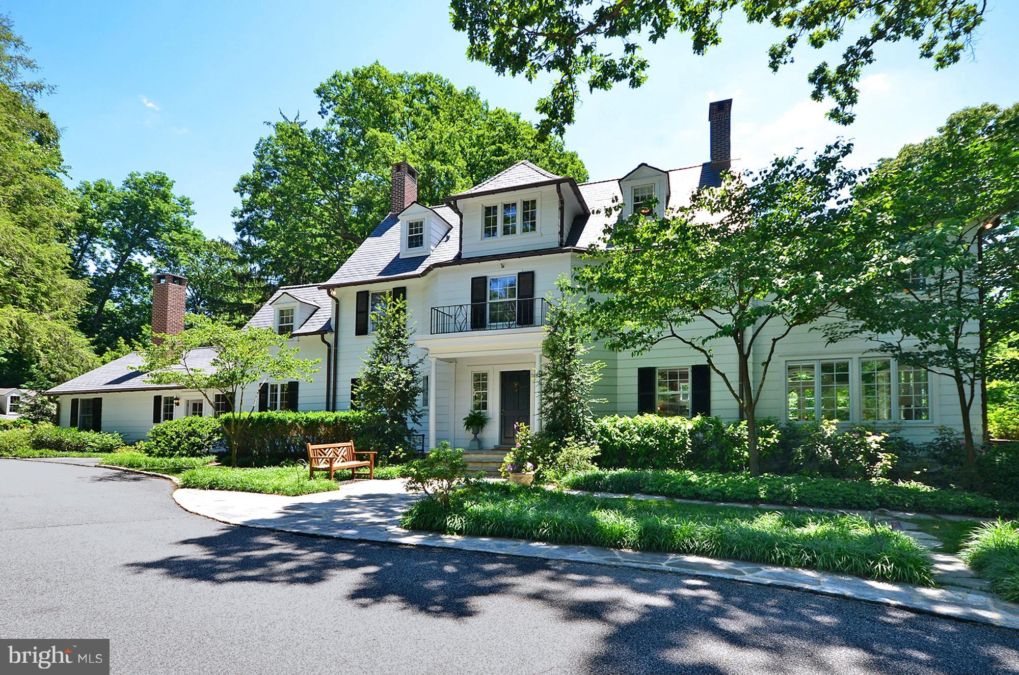 Ideally located, turn of the century colonial exudes charm& grace. Extraordinary maintained 5 bedroom, 4 full bath  is magnificent w/ top-of-the-line kitchen, light filled rooms, stone terraces, in-ground pool, guest house, & garage. Private & serene setting atop overlook 3.62 acres of professionally landscaped gardens. Great for entertaining or casual everyday living. This is paradise.
