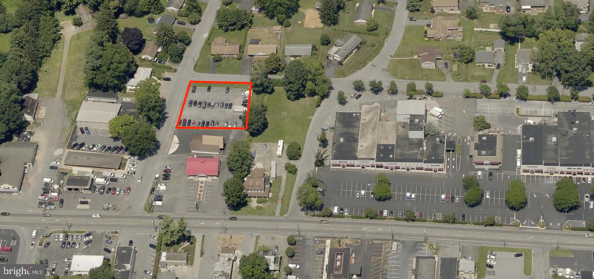 +/- 0.41-Acre Parking Lot & Commercial Development Site | CBC Zoning | Columbia Avenue Corridor

+/- 0.41-acre parcel on Wilson Avenue, zoned CBC, currently improved as a graveled parking lot with an estimated capacity of +/- 56-60 spaces. The site offers straightforward value as a parking facility serving the surrounding commercial corridor or as a development opportunity, either alone or as part of an assemblage with the two neighboring parcels.

CBC zoning supports a range of commercial uses. The two adjacent parcels are also available individually or together -- the 1,976 SF commercial building at 9 Eisenhower Blvd on +/- 0.30 acres and the 1935 Columbia Ave commercial building on +/- 0.42 acres -- bringing the total land area to +/- 0.71 acres with the Eisenhower parcel, +/- 0.83 acres with 1935 Columbia Ave, or +/- 1.13 acres if all three parcels are acquired together.