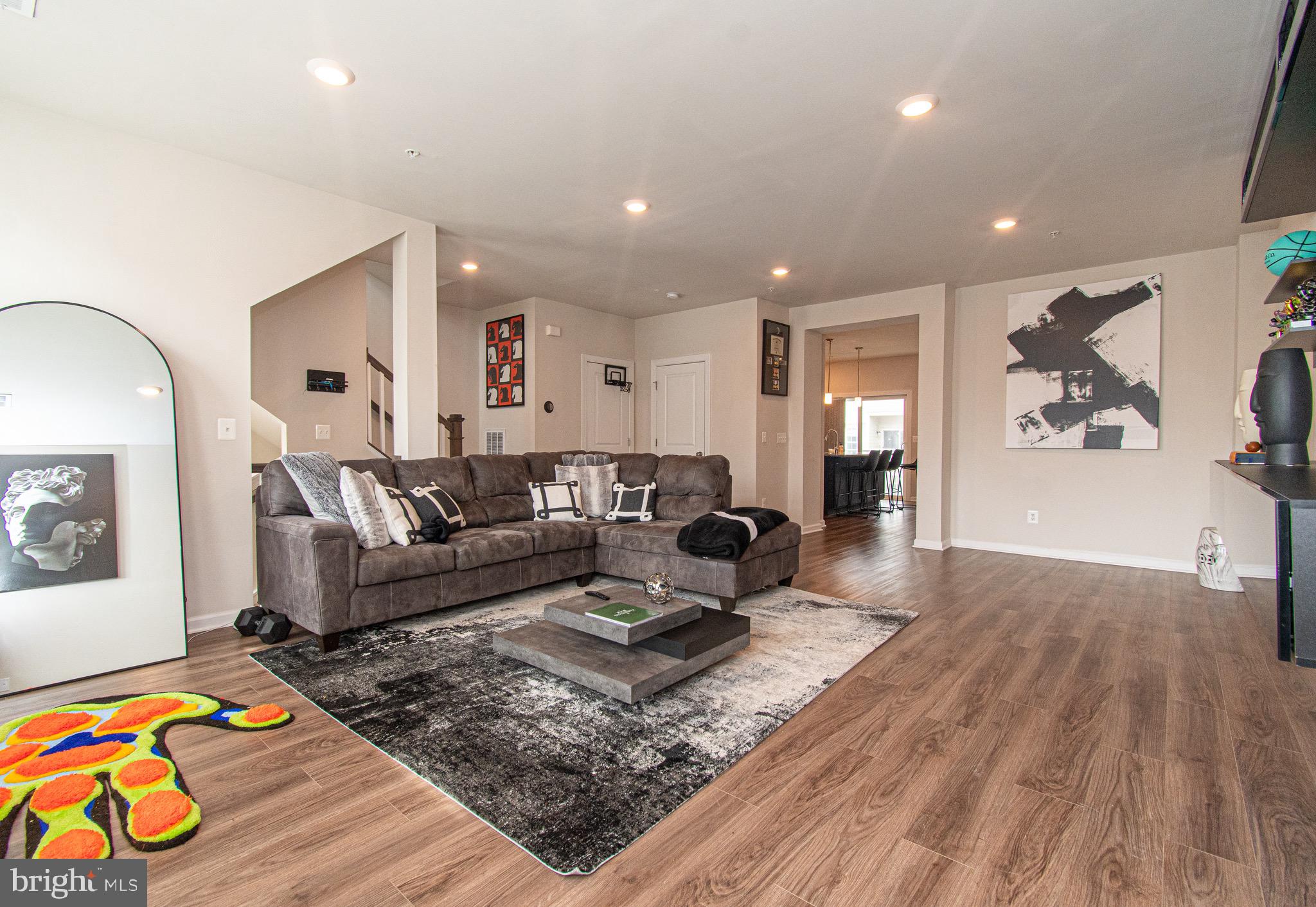 Come and see your new home! This beautiful, newly built (2021) townhouse will be ready for a JUNE 2024 move in. At over 2,300sqft, this spacious home has 3 beds and 2.5 baths. Walk in and head upstairs to the large living room, half bath and open floor plan kitchen. The dining room hosts an electric fireplace, with a balcony off of the kitchen. The upper level hosts 3 bedrooms, large washer & dryer with full bathroom in the hallway. The Owners Suite includes the en suite bathroom with separate glass shower and bath tub.  One car garage and off street parking. 1 Mile from major shopping area with Starbucks & Target, schedule your showing today!