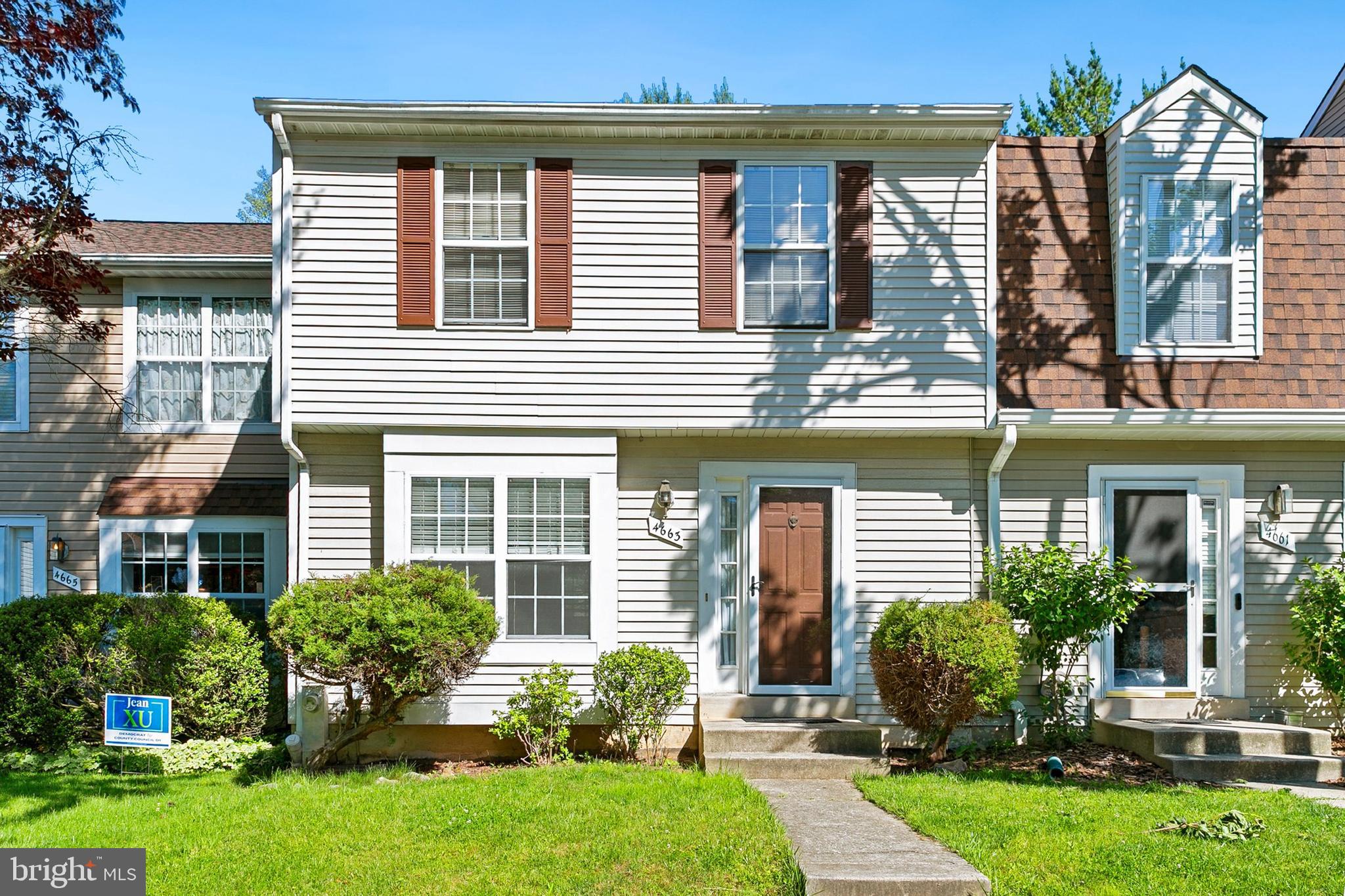 Before you even step inside, you'll understand why homes in highly sought-after Dorsey Hall are so coveted! Welcome to 4663 Hallowed Stream, a beautifully maintained 3-bedroom, 2 full bath, 1 half bath townhome offering a spacious, open layout and an unbeatable Ellicott City location.

Step inside and immediately notice the abundance of natural light streaming through the large box bay window in the living room. The open-concept main level is enhanced by crown molding and provides the perfect setting for both everyday living and entertaining. The country kitchen spans the entire width of the home and features granite countertops, ample cabinetry, a convenient pass-through to the dining and living room areas, and easy sightlines that make hosting a breeze. A sliding glass door leads directly to the rear deck, creating the perfect space for outdoor dining, entertaining, or simply relaxing while overlooking the backyard.

Upstairs, you'll find three generously sized bedrooms and two full bathrooms. The spacious primary suite features luxury vinyl plank flooring, two closets, and a private en-suite bath. Two additional well-proportioned bedrooms share the hall full bathroom.

The finished lower level offers even more living space with luxury vinyl plank flooring throughout, a convenient laundry area, half bath, and an expansive family room centered around a wood-burning fireplace. A sliding glass door provides direct access to the patio and backyard, making this a true walkout lower level and allowing for seamless indoor-outdoor living.

Recent updates include a new roof (2025) and washer (2026), providing added peace of mind for years to come.

Enjoy all that the Columbia Association lifestyle has to offer, including more than 3,600 acres of open space, over 100 miles of pathways and sidewalks for walking, jogging, and biking, multiple pools, fitness centers, lakes, playgrounds, summer camps, and countless community activities.

Located within close proximity to top-rated schools, shopping, dining, and entertainment, commuters will appreciate easy access to Routes 29, 100, 40, I-70, and I-695.

Check out the virtual tour!!