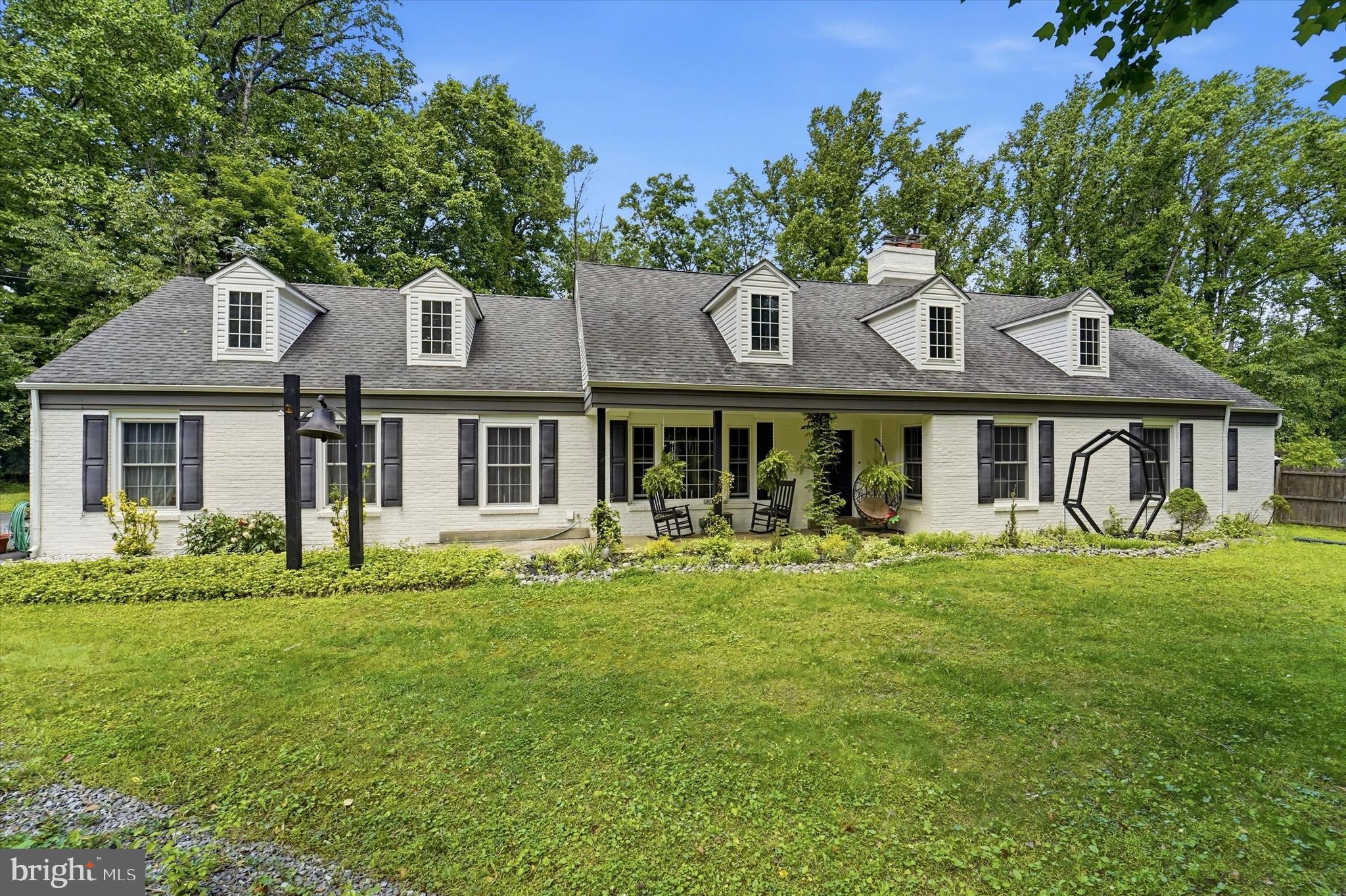Welcome to this spacious and beautifully maintained 5-bedroom, 3 full-bath, 2 half-bath Cape Cod home located in the highly desirable Rose Tree Media School District. Situated on a private 1.59-acre lot in Upper Providence Township, this exceptional property offers over 4,200 square feet of living space, combining classic charm with modern comfort.

The home's versatile floor plan features a first-floor primary suite with a recently updated en-suite bathroom, dressing area, and walk-in closet. Multiple living and entertaining spaces include a formal dining room, expansive living room, family room, and a large eat-in kitchen complete with an island, gas cooking, and ample storage.

Step outside and enjoy your own private retreat. The beautifully landscaped grounds feature a large in-ground swimming pool and a fully equipped pool house with a half bath, sink, and refrigerator—perfect for entertaining family and friends throughout the summer months. Adding to the property's unique appeal are two picturesque ponds: a tranquil koi pond and a separate turtle pond, creating a peaceful, park-like setting rarely found in today's market.

Mature trees, lush landscaping, and a spacious rear yard provide privacy and serenity, while the two-car attached garage and abundant off-street parking offer everyday convenience. The property also provides easy access to major roadways, shopping, dining, and local employers.

This one-of-a-kind property offers the perfect blend of space, privacy, and resort-style amenities in one of Delaware County's most sought-after locations. Whether you're entertaining guests poolside, enjoying the natural beauty of the grounds, or simply relaxing at home, this exceptional property delivers a truly unique living experience.
