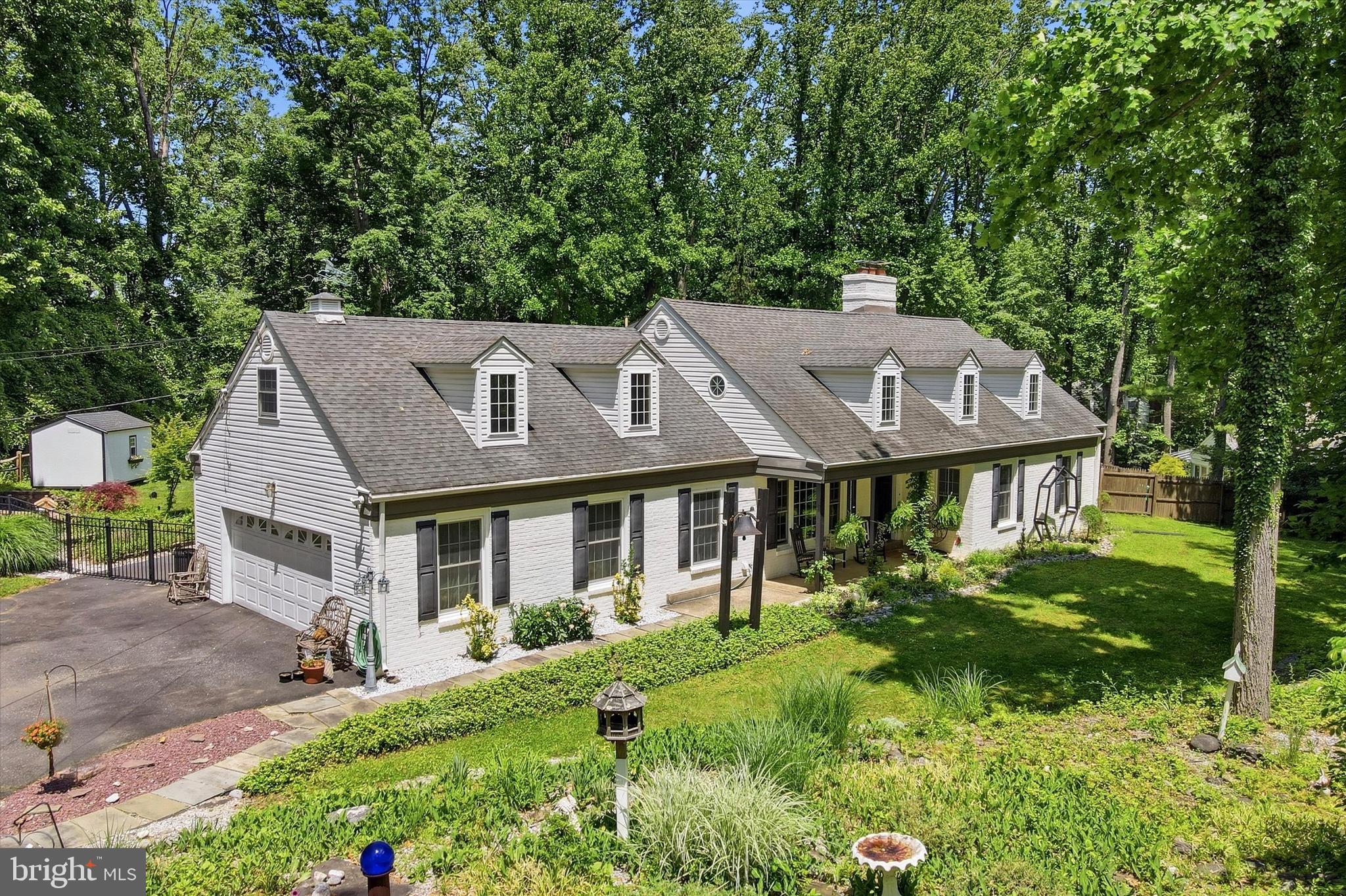 Welcome to this spacious and beautifully maintained 5-bedroom, 3 full-bath, 2 half-bath Cape Cod home located in the highly desirable Rose Tree Media School District. Situated on a private 1.04-acre lot in Upper Providence Township, this exceptional property offers over 4,200 square feet of living space, combining classic charm with modern comfort.

The home's versatile floor plan features a first-floor primary suite with a recently updated en-suite bathroom, dressing area, and walk-in closet. Multiple living and entertaining spaces include a formal dining room, expansive living room, family room, and a large eat-in kitchen complete with an island, gas cooking, and ample storage.

Step outside and enjoy your own private retreat. The beautifully landscaped grounds feature a large in-ground swimming pool and a fully equipped pool house with a half bath, sink, and refrigerator—perfect for entertaining family and friends throughout the summer months. Adding to the property's unique appeal are two picturesque ponds: a tranquil koi pond and a separate turtle pond, creating a peaceful, park-like setting rarely found in today's market.

Mature trees, lush landscaping, and a spacious rear yard provide privacy and serenity, while the two-car attached garage and abundant off-street parking offer everyday convenience. The property also provides easy access to major roadways, shopping, dining, and local employers.

This one-of-a-kind property offers the perfect blend of space, privacy, and resort-style amenities in one of Delaware County's most sought-after locations. Whether you're entertaining guests poolside, enjoying the natural beauty of the grounds, or simply relaxing at home, this exceptional property delivers a truly unique living experience.