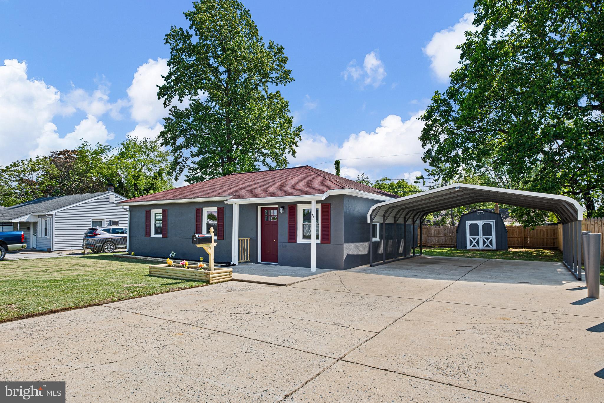 Back on market, no fault of the seller. Welcome to 22 Memorial Drive in the conveniently located community of Garfield Park. This beautifully renovated, move-in ready home has been updated from top to bottom, offering the perfect blend of modern style and major system improvements for peace of mind. Step inside to discover a completely reimagined interior featuring new drywall, fresh paint throughout, and upgraded lighting with recessed fixtures in the main living areas. The redesigned kitchen showcases solid wood cabinetry, granite countertops, ceramic tile backsplash, new Stainless-Steel appliances, updated flooring, and a newly added pantry. The layout has been opened to the dining area, creating a bright and functional flow ideal for both everyday living and entertaining. The bathroom has been fully renovated with new fixtures, ceramic tile, flooring, and lighting. All three bedrooms feature new flooring, doors, trim, and ceiling fans. A brand-new laundry room has been thoughtfully added with all new plumbing, electrical, and finishes. Additional highlights include attic access with installed steps and new luxury vinyl plank flooring throughout the entire home. Major system upgrades provide exceptional value and confidence, including a new 150-amp electrical service and panel, all new wiring, a high-efficiency heat pump HVAC system with central A/C, and an attic fan with automatic thermostat. Outside, the home has been refreshed for both curb appeal and functionality with newly parged and painted exterior surfaces, all-new Low-E vinyl windows with wood trim and aluminum wrapping, updated shutters and lighting, and rebuilt roof overhangs at both the front and rear entrances. Additional improvements include a new rear electrical connection pole and exterior emergency shutoff (2026 code compliant), replaced backyard fencing, and repaired and painted sheds. The roof was replaced in 2015 with 30-year architectural shingles. With quick access to Route 13, I-295 and I‑95, commuting to the Wilmington Airport as well as the Philadelphia Airport or exploring the tri‑state area is a breeze. With its thoughtful renovations, upgraded systems, and turnkey condition, this home offers low-maintenance living and lasting value. Don’t miss your opportunity to own this fully renovated gem!