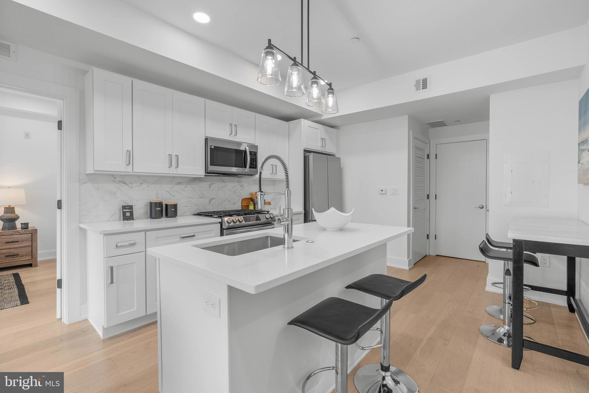 Introducing Artisans Edge – a stunning luxury condo development located on one of the most desirable blocks in Northern Liberties, one of Philadelphia’s most dynamic and sought-after neighborhoods. Most importantly this home has the ORIGINAL FULL 10 Year Tax Abatement, not the new graduated version. Known for its artistic roots, eclectic charm, and thriving food scene, Northern Liberties offers an unmatched blend of culture, creativity, and convenience. Artisans Edge features 13 thoughtfully designed residential units, each offering a modern and luxurious living experience with sleek, high-end finishes throughout. Choose from a variety of floor plans, all featuring spacious 2 bedroom, 2 bathroom layouts with open concept living, curated luxury finishes, a huge shared roof deck and top-of-the-line appliance packages. Live just steps from vibrant 2nd Street, where you’ll find some of Philadelphia’s best dining, nightlife, and boutique shopping. You're also minutes from neighboring Fishtown, giving you even more options for weekend brunches, craft cocktails, and live music. There is a tax abatement (old abatement!). Taxes are not $1. Taxes & square footage are the buyer's responsibility to verify independently. Even though this is a new condo building, the Sellers preferred lender has 30 year fixed 5%-10% down mortgage products for this building. Please inquire with the listing team. The PAR Standard Agreement of Sale for New Construction of sale must be used for new construction properties whether completed or not. Parking is at a nearby lot (943 N 2nd St) for $325/month - while they last! Parking credit for one year must be noted on the agreement of sale if the buyer desires parking to be included with an acceptable offer.