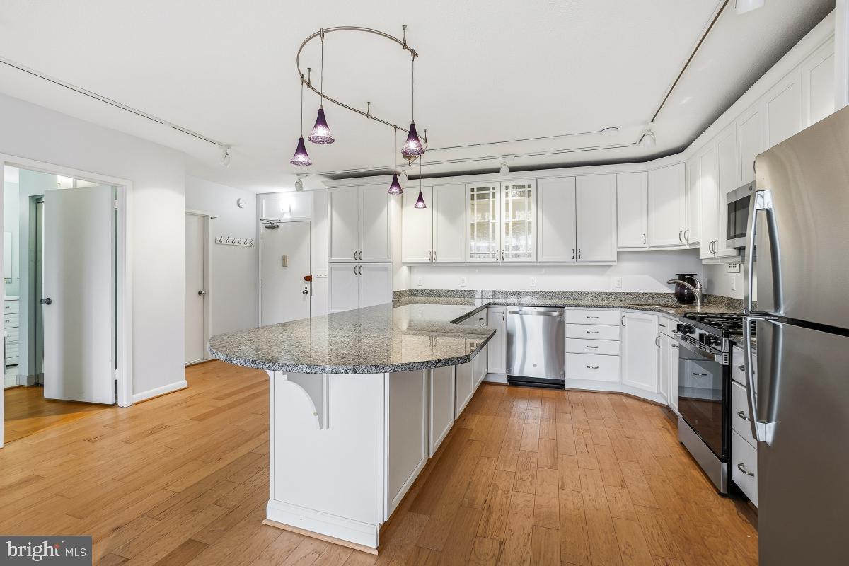 PURCHASE WITH CASH OR A LOAN. Experience elevated living at the prestigious Riviera of Chevy Chase, where exceptional amenities and convenience come together in one of the area’s most sought-after communities. This beautifully updated, move-in-ready condo offers stunning skyline views, abundant natural light, and the rare bonus of a dedicated indoor garage space. You will reside just a few short blocks from BCC High School, Bethesda downtown, and Medro. Inside, rich wood flooring flows through the open-concept living and dining areas, creating a bright and inviting atmosphere perfect for both relaxing and entertaining. THE LONG ON-THE-MARKET DATES ARE OVER AS FNMA HAS LIFTED ITS LOAN RESTRICTIONS, THE REQUIRED EXTERIOR IMPROVEMENTS ARE COMPLETED.  ANY LOAN TYPE MAY NOW BE APPROVED BY FANNIE MAE. This beautifully renovated gourmet kitchen is designed to impress, featuring sleek stainless-steel appliances, elegant cabinetry, premium countertops, and generous prep space—perfect for both everyday living and sophisticated entertaining. The spacious bedroom provides a peaceful retreat, while the updated bathroom features elegant contemporary finishes. The condo fee includes all utilities (electric and water/sewer), adding even more value and convenience.
Residents also enjoy access to an in-house fitness center, lounge and party room, rooftop pool, and laundry facilities conveniently located on every floor. Best of all, a dedicated garage parking space is included with the purchase.
Perfectly situated just minutes from downtown Bethesda, this prime location offers easy access to premier shopping, dining, and entertainment while maintaining the quiet charm and appeal of Chevy Chase living.
This property also presents an outstanding investment opportunity. Whether you are searching for a primary residence or an income-producing asset, future tenants will appreciate the luxury amenities, prime location, and convenience this exceptional condo provides.