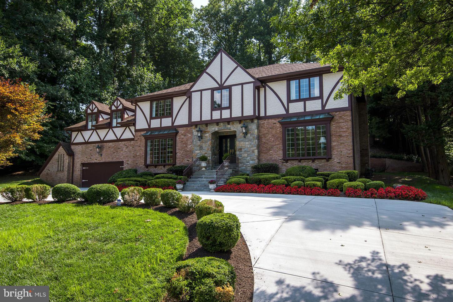 Exquisitely Renovated w/ clean stylish lines, stunning materials, & state-of-the-art amenities! 7,250+/- SF floor plan w/3-finished levels, gracious rms, gourmet marble Chef's Kitchen open to Breakfast & Family Rm,  Liv Rm & formal Din Rm connected by 2-story foyer w/dramatic curved staircase. 7 Bedrooms, 5.5 new Baths - Must See Master Bath!!! 2 car garage. Garden/Patio off Main Level.