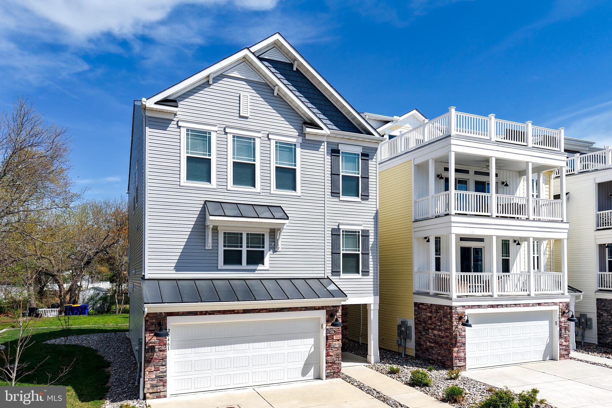 BEST DEAL IN TOWN! This like-new,detached home built in 2022, offers the perfect blend of coastal luxury and modern convenience in sought-after Oyster House Village jut outside the city limits of Rehoboth Beach! Featuring 4 spacious bedrooms, 3.5 baths, and a rare 3-car garage, this stunning three-level home is designed for both comfort and entertaining.
Enjoy multiple screened porches and a private deck overlooking the canal—ideal for relaxing evenings, morning coffee, or watching wildlife and boats drift by. As an end unit, the home is filled with natural light and includes additional windows and extra living space not found in interior units.
The home is being sold partially furnished, making it an easy move-in or turnkey beach retreat.
Community amenities elevate the lifestyle, including a pool, dock for kayaking and paddleboarding, and a peaceful setting for birdwatching or simply enjoying the water views. A nearby public boat ramp provides convenient access for jet skis and boats.
Located less than 2 miles from the beach and boardwalk, this home offers quick and easy access to downtown Rehoboth Beach attractions—without the hassle of crossing Route One.
Don’t miss this exceptional opportunity to own a nearly new coastal getaway in a prime location!
Great rental potential!  7 day minimum in the summer and 3-4 day rentals permitted in the off season.