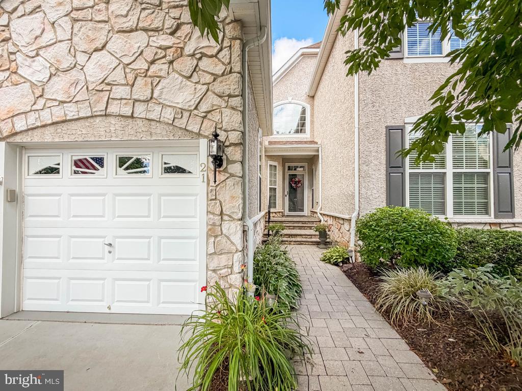Looking for a carefree lifestyle? Your search may be over once you purchase this gorgeous carriage home, featuring three Bedrooms and four Full Baths. Main level living if you need or so desire, offering the Owner's En Suite; a Second Bedroom and Bathroom; Kitchen; Dining Room; Great Room with double-sided gas fireplace and sun tunnel; Sunroom sharing the gas fireplace, opening to the deck. A balcony runs along the second floor overlooking the Great Room, and featuring a Third Bedroom and Full Bath; two Bonus Rooms and open Loft/Den. The Lower Level is finished and offers a huge Recreation Room; Office; Full Bath; and yet plenty of storage. Newer roof; HVAC; Whole House Generator. Located across from the Clubhouse with its inviting outdoor and indoor pools; tennis and pickleball; bocce; fitness centre; walking trails. 55+ never looked so good! Conveniently located within minutes to Hwy 295 for commute to Philadelphia and the Princeton Corridor; railway station for New York City; shops and restaurants in nearby Yardley, New  Hope and Newtown and within walking distance to historic Washington Crossing Park.  Warning: pack your suitcase . . . you won't want to leave! 
Note: Settlement not before mid to late September
