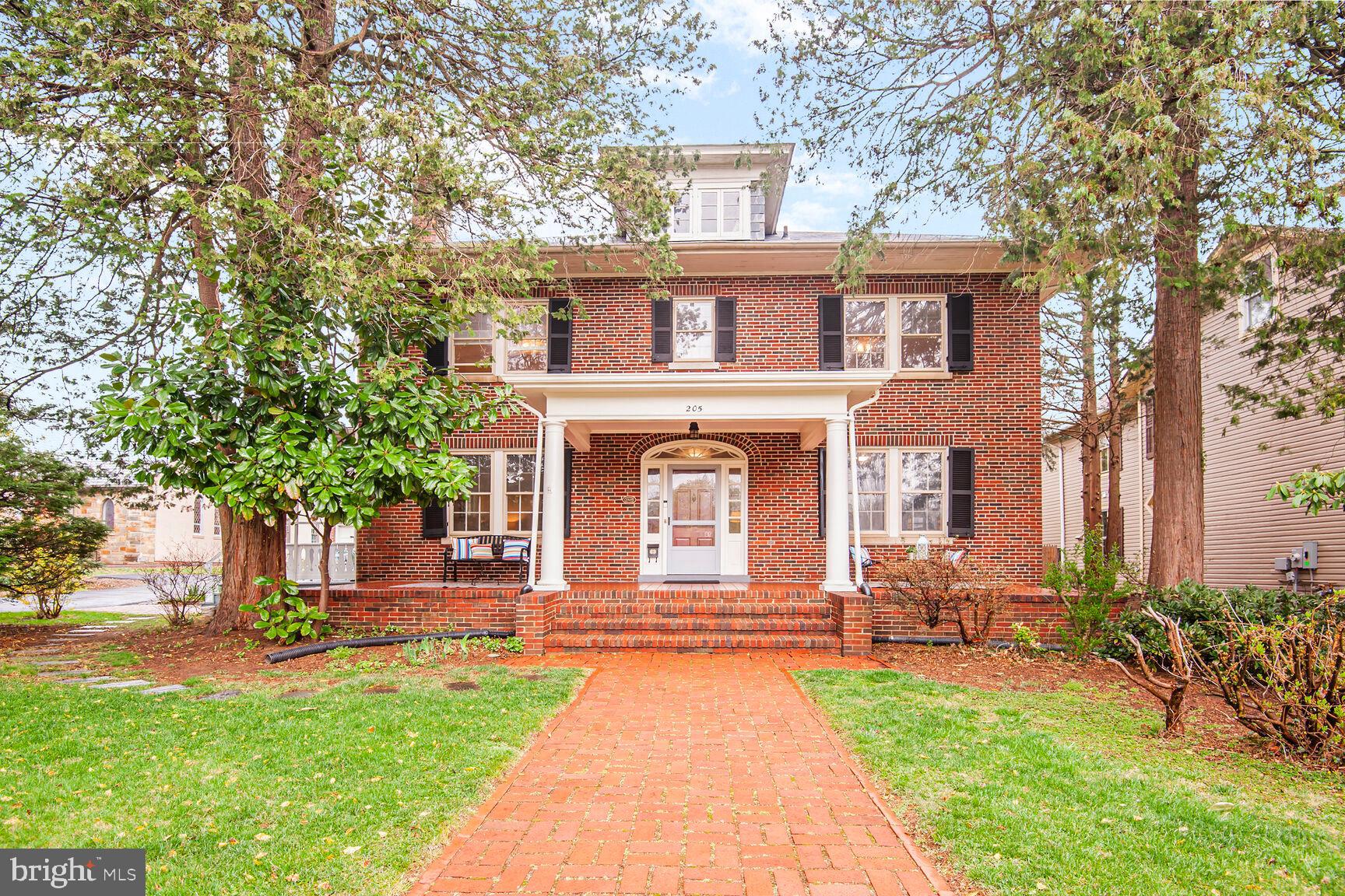 Centerpiece of Historic Rockville.  All Brick Four Square Home.  Perfectly symmetrical, with matching double windows on two levels and dormers above.  Wide brick walk leads to columned and elevated front porch. High ceilings, wide center hall, original millwork, ballusters, handrails, wood floors, porches galore, mature landscaping, brick walks, brick detached 2-car garage.  Fully finished large basement. Huge backyard with spacious patio. The whole property is beautifully landscaped.  Two car detached garage.  Turn around driveway.   Walk to downtown shops, library,  Courthouse, Metro.  Owner Agent.  Open this Saturday and Sunday 1-3 PM.