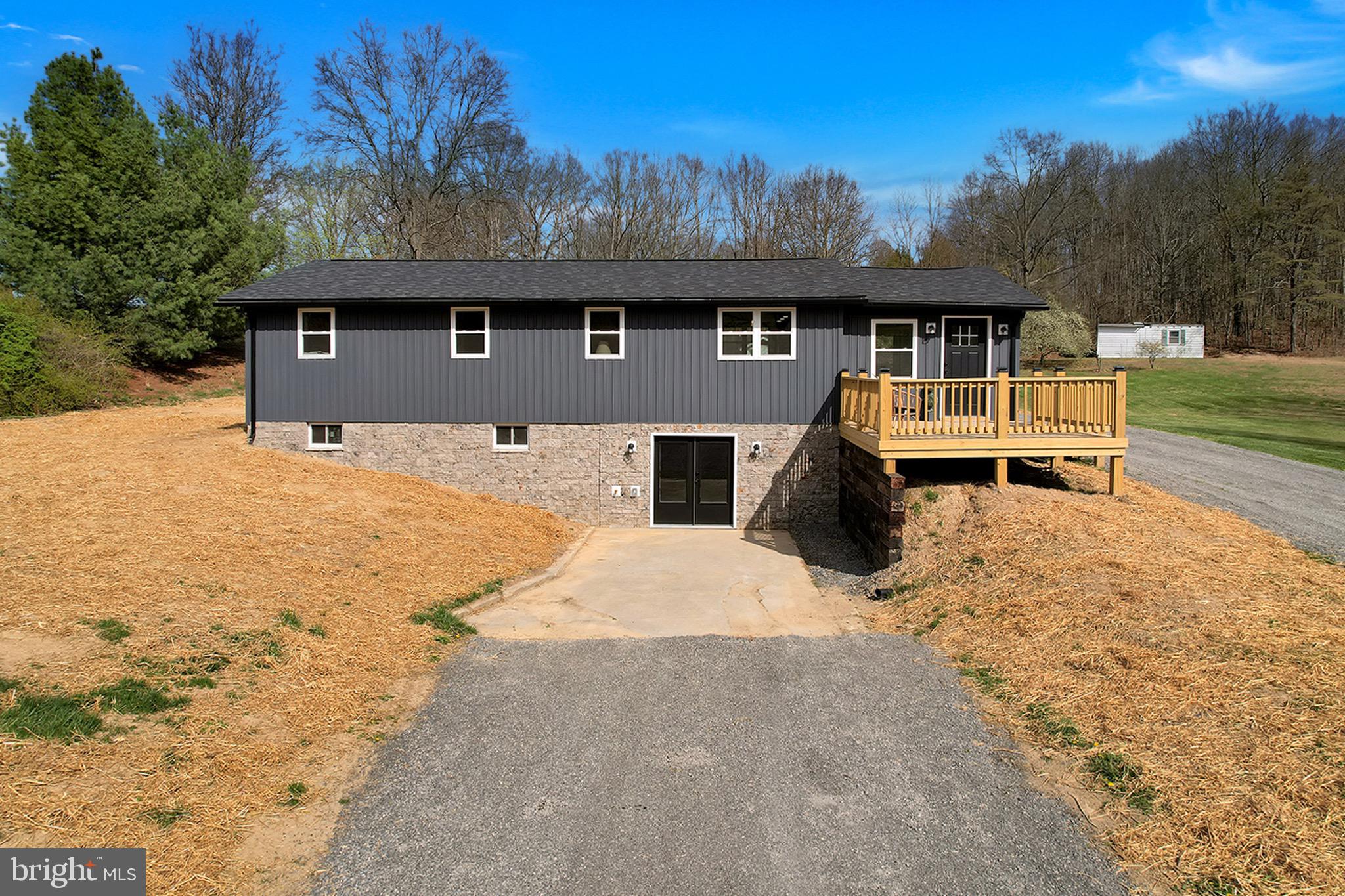 When modern updates meet peaceful country living! Welcome to 502 Sol Shanholtz Rd! Situated on  2+ beautiful acres, this fully remodeled 3-bedroom, 2-bath home has been completely transformed from top to bottom, offering the feel of brand-new construction without the wait! Step inside and you’ll immediately notice the fresh,  finishes! New LVP flooring throughout, creating a clean and stylish look that’s also durable and low maintenance. The beautifully updated kitchen features gorgeous butcher block countertops and brand new stainless steel appliances, making it a warm and inviting space to cook, gather, and entertain! This home doesn’t just look new it is new! Major upgrades include a new roof, new HVAC system,  new windows, updated electrical and plumbing throughout, giving you peace of mind and energy efficiency for years to come! Outside, you will find the perfect setting for relaxing, gardening, or simply enjoying the fresh West Virginia air!  Located just 1 mile to Route 50 you are within minutes of school, restaurants,  local shopping, and just 45 minutes from Winchester VA! Don't wait schedule your showing today!