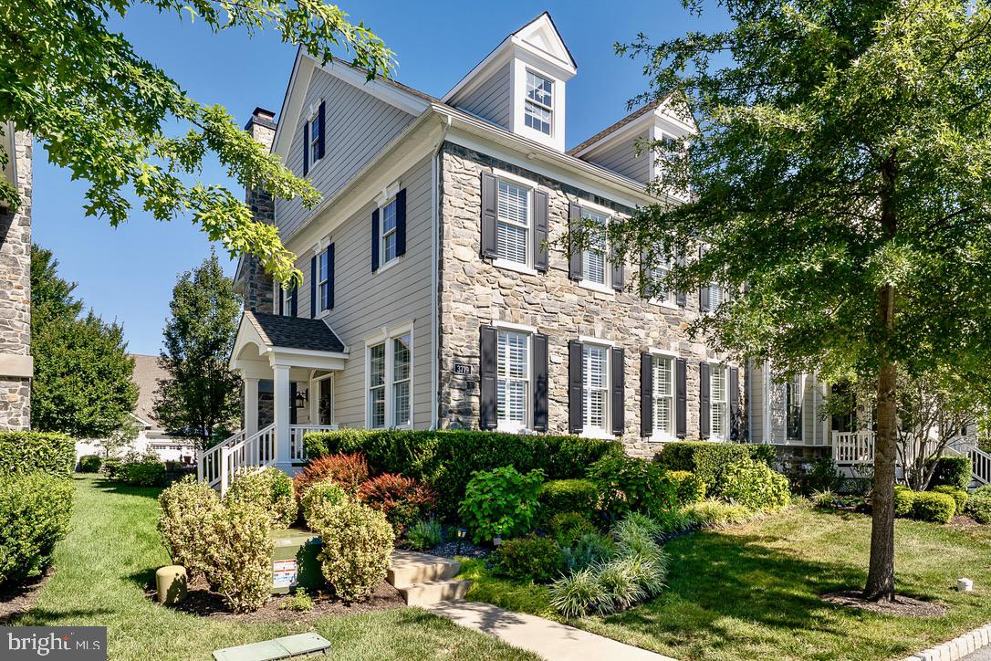 Welcome to this outstanding end unit townhome located in The Village neighborhood of Liseter.  It is elegantly appointed and upgraded with high quality materials, and one of the few homes that boasts a secluded and delightful patio, thoughtfully designed to create a garden oasis rarely found in a townhome community.  Enclosed with a knee wall, highlighted by indirect lighting, and surrounded by luscious bushes, flowers and small trees, this garden patio is perfect for daytime or evening relaxation.  It is connected to the home via a raised deck and gas grill, with permanent gas line connection.  The stone presentation facing the quiet street allows for a covered front porch and side entry front door which opens into a two story foyer and curved staircase.   Windows on three sides of this well designed home allow for wonderful natural light to flow throughout the main floor.  The rooms flow gracefully in this open floor plan design as the Foyer opens into the Great Room and then into the chef's kitchen.  The inviting Living Room is bright and open, and features plantation shutters, a fireplace with contemporary design and traditional mantel, hardwood floors an recessed lighting.  This room adjoins the gorgeous Kitchen with stunning granite island, Bosch Gas cooktop, Subzero refrigerator, Miele dishwasher, Moen "touchless" faucet, and contemporary pendant lighting.  The Butler's Pantry with wine refrigerator connects the Kitchen to the Dining Room, a lovely room with elegant tray ceiling and plantation shutters.  The spacious Office enjoys a more private location, away from the open flow of the main floor.  Of special note throughout the main floor are the plantation shutters, the hand scraped wood floors, and recessed LED lights.  The  updated Powder Room and large coat closet complete the central part of the main floor, while the Laundry facility provides access to the garage, the patio and the stairs leading to the Bonus Room which is currently serving as a woodworking shop.  This room offers hardwood floors and a mini split system for individual temperature control.  Returning to the Foyer, the staircase with wood floor  leads to an open hallway  with balcony overlook, and the hardwood floors continue into the Primary Suite which boasts a vaulted ceiling and a custom deisgned large walk in closet organized by California Closet Systems.  Double doors open into the primary Bath with two separate vanities wih marble tops,  a soaking tub, and large walk in shower.  Two additional Bedrooms, each with Califonia closet systems, and a Hall Bath with double sinks and tub/shower combination, complete the second floor.  The finished Lower Level offers a family room with luxury vinyl plank flooring, a Fitness room and a half Bath.   The 2 car garage enters from Parlo Mews, and has direct access into the house.  In addition to all the special features of this home, its excellent placement in the larger community provides for easy access to all the amenities that Liseter offers - The Barn, sports facilities, the pool, walking trails, the community center and much more.  This outstanding home is uniquely designed to meet every need and to provide a lifestyle in this well planned community, located in close proximity to wonderful shopping, dining and recreational activities.  Don't miss the opportunity to make this lifestyle. your very own!  Showings begin on Wednesday, Sept. 3rd.