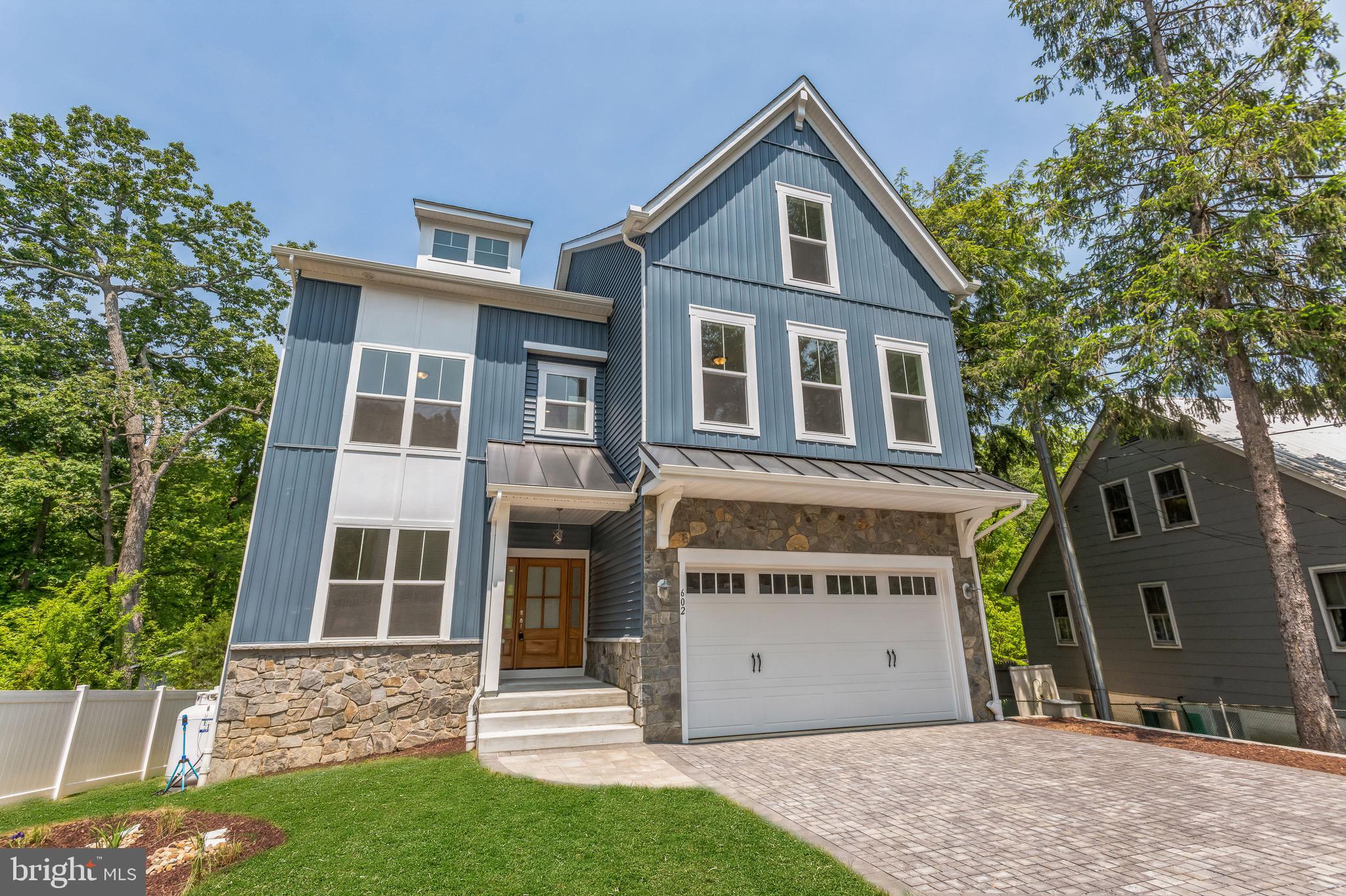 JUST COMPLETED NEW CONSTRUCTION!!! WATERFRONT VIEWS FROM EVERY FLOOR! PIER INCLUDED!!  This impressive, generously spacious 7 bedroom, 6 bathroom build is a dream home in a desirable water front community. Soft contemporary neutral tones and bright recessed lighting are complemented by brilliant natural light that pours into expansive living space. Entertain in the fabulous great room with a floor to ceiling stone fireplace, served by a sleek chef's kitchen with  quartz countertops and premium appliances. Other highlights include gorgeous water views from multiple vantage points, a 2 car garage, a rear deck and rooftop terrace, an owners suite with a spa-like bath, and a completely finished walk out basement. Enjoy the comfort of being near exemplary schools, the city of Annapolis, dining, shopping and water activities. Also near major commuting routes to D.C, Baltimore, And the Bay bridge.

- Floor plan and site plan is included in documents.
- Make sure to check out virtual tours of past projects!