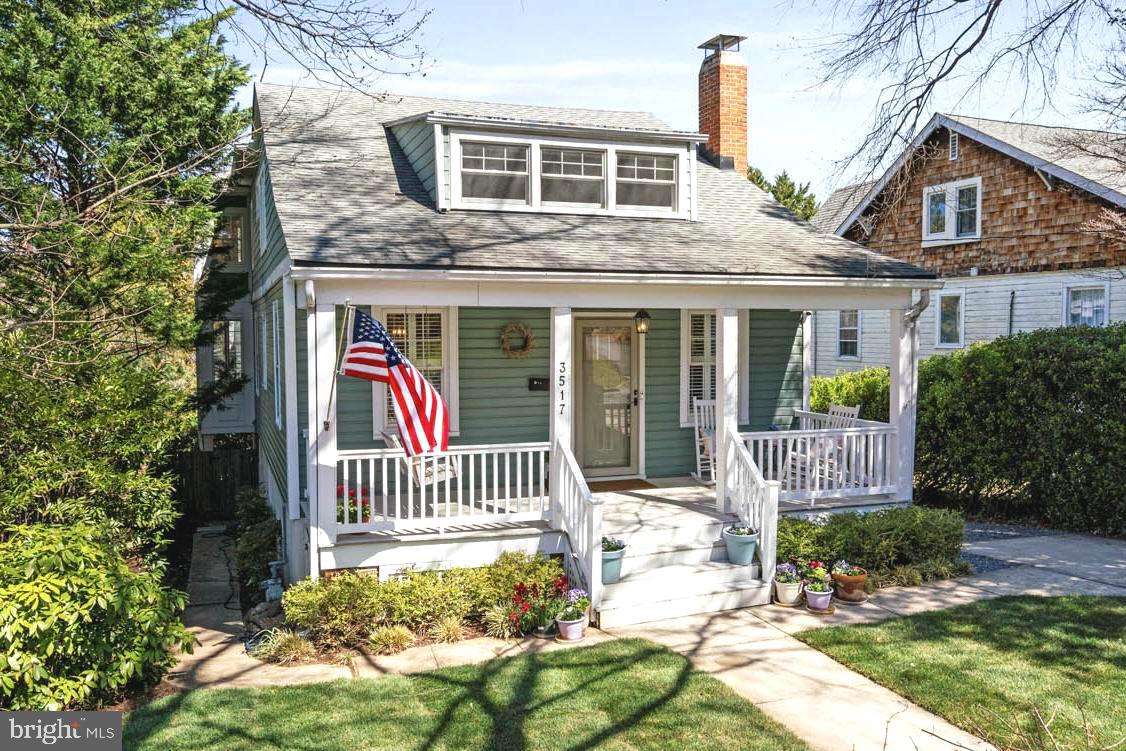 New price for your new life! The cutest home in all of Martins Additions. Deceptively spacious, with amazing entertainment spaces, this Chevy Chase bungalow is nestled among mature trees, flowering plants, and a quintessential white picket fence.  Located in sought-after Village of Martin’s Additions, 3517 Turner Lane is a beautifully updated 1920s bungalow offering charm, comfort, and an effortlessly livable layout. With five bedrooms, four full baths, and over 3,000 square feet of finished living space across three levels, this home blends classic character with thoughtful updates designed for modern living.

From the moment you arrive, the white picket fence and covered front porch set a welcoming tone and hint at the life inside. Sunlight pours into the open living and family rooms, where a wood-burning fireplace and hardwood floors create a warm and inviting atmosphere. The generous dining room offers the perfect setting for everything from casual weeknight dinners to festive holiday gatherings.

The heart of the home is the updated kitchen, featuring Bosch appliances, sleek finishes, and a bright breakfast sunroom overlooking the private, fenced-in backyard. Step outside to enjoy morning coffee or host friends on the deck – this home was made for both easy everyday living and memorable entertaining.

A main-level bedroom (or office/den) and full bath offer flexible separate space for guests, working from home, or quiet retreat.

Upstairs, you’ll find four generously sized bedrooms, including a spacious primary suite with treetop views and streaming morning sun. A private sitting room, a walk-in closet and updated bath make this more than a retreat – it’s a sanctuary.  Roomy with a multitude of owner configuration options, the second level features three additional bedrooms and a renovated full bath, along with laundry room and storage.

The fully finished, walk-out lower level adds even more versatility, with brand-new carpet, a large recreation room, bonus space for hobbies or often used as a spacious guest suite, extra storage and another full bath. Access to the covered back patio, storage shed, and verdant back yard encourages seamless indoor-outdoor living.

Private parking, updated and well-maintained systems, and a movie-set-quality location, move right in and start enjoying life on Turner Lane from day one.

Chevy Chase, Silver Creek, and B-CC school serve the neighborhood.  Located just a block from Brookville Market, La Ferme, and neighborhood parks and schools, this home sits in one of Chevy Chase’s most cherished communities—where tree-lined streets, timeless architecture, weekend strolls to Avalon Cinema or Rock Creek Park, and a close-knit feel define daily life.