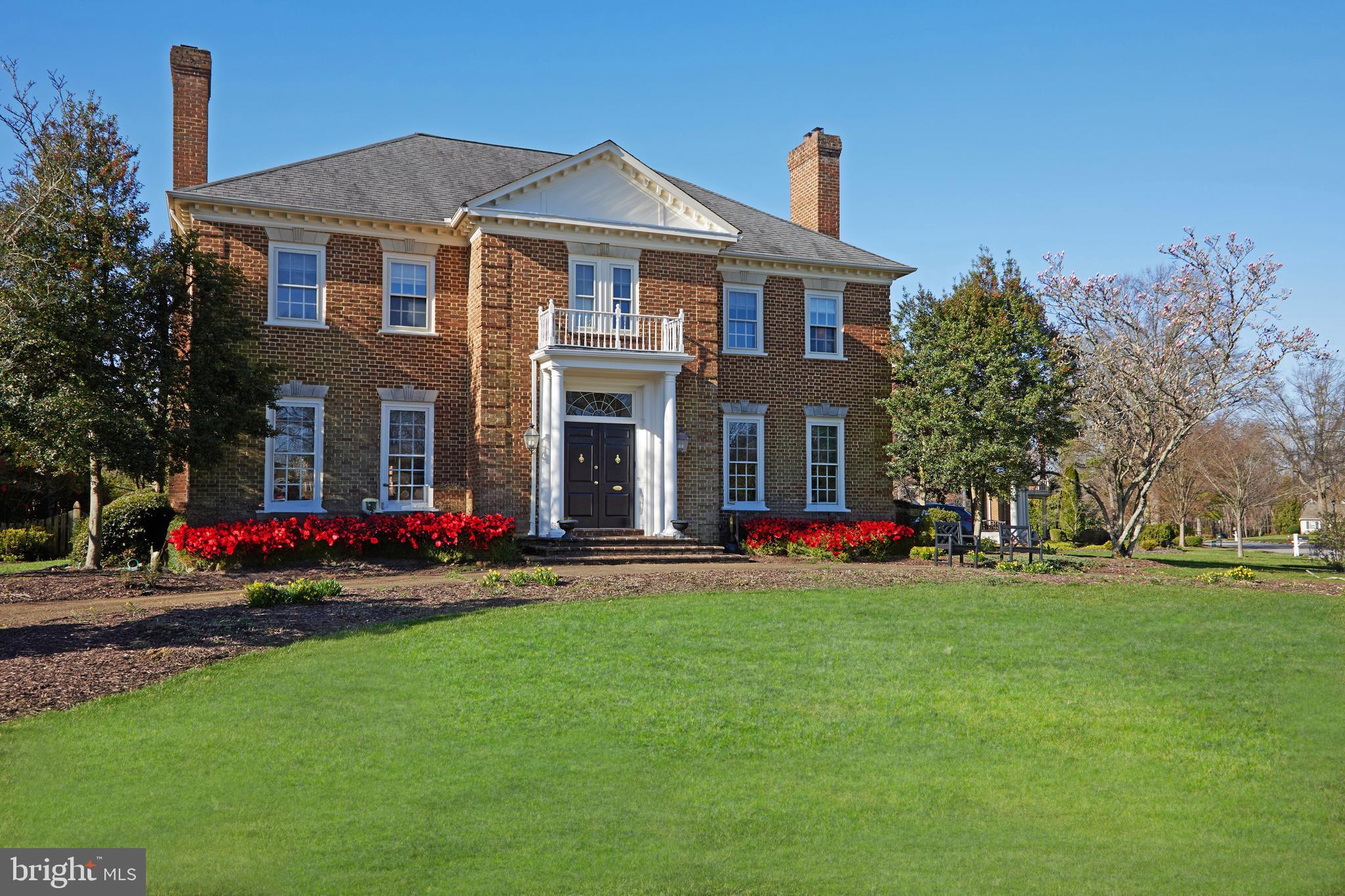 Glorious News on the Corner …. At the intersection of fun and comfort, a sparkling classic Georgian colonial home is now on the Spring Market in the unique Mount Vernon on the Potomac neighborhood.  Standing tall on almost one-half acre, this stunning Eugene Cullinane-built home was the Model for the water-privileged community of 116 houses & all of its features – curving streets, private waterfront park & delightful residents all around.
Sited with a wide front lawn & circular drive to the front, 9329 Mount Vernon Circle will again soon to be wrapped in flowering bushes, bulbs & plants.  Azaleas, peonies, coleus abound – there are even magnolia trees & a dear Pollinator Garden designed to attract butterflies & birds.  The huge 2-car garage + driveway are tucked around the corner out of sight.  Don’t overlook the beauty of the hand-molded brick wrapping the exterior – a signature feature of the builder Cullinane, who earned his stellar reputation for quality construction.
The welcoming. columned entry opens into a wide, center hall foyer as the home spreads broadly for casual and formal living inside.  10-foot ceilings & generously-sized rooms are just the beginning – so much to see, from the egg & dart ceiling moldings with dentil molding accents & elaborate details in the public rooms, rich wood floors everywhere, recently updated eat-in kitchen and plenty of bedrooms & baths for family and visitors.  
Well-placed rooms allow for parties in the family room, games in the recreation room & work spaces/offices upstairs and down.  The large Primary Bedroom is blessed with a private bathroom & a hideaway sitting room for late night reading or TV watching, while the other 4 bedrooms upstairs are well-served with 2 additional bathrooms.  Big windows throughout grace the home with bountiful light. The fully finished lower level offers a full bath, laundry area & mechanicals, as well as a den, storage & romping space.
The MVOP waterfront park is a beautiful walking destination after dinner.  The pond, play area, updated docks & tennis/pickleball courts overlook the Potomac River.  All day long, permanent picnic tables encourage you to sit & visit.  The annual $1,500/home fee, which is paid to the Mount Vernon on the Potomac Citizens Association, covers professional management, the common area near entry on Ferry Landing Road, private park maintenance (including tennis courts, bathrooms, grounds and occasional MVOP gatherings), road maintenance including snow removal, trash pick-up (twice a week) & recycling (once a week).  Marina slips are available for a separate fee.
To note along the way:  Many electrical updates; 14-inches of insulation blown into entire attic (2023); new HVAC (2022); washer and dryer (2023; gas cooktop (2021), refrigerator (2023); double wall ovens (2023); sink faucet (2023); new vanities and mirrors in primary bath. 2 hot water heaters.
You’ll likely feel as if you are permanently on vacation – all in the best location, just 11 miles south of Old Town Alexandria.

Everyone always asks about electrical improvements, so the sellers have written a detailed list of their projects:
Front doorway lanterns:  Rewelded with lead.  They are not antiques, but very nice and perfect for the house.  Then Becker Electric re-did the wiring for them to make them safer.  Dimmer put on interior switch to operate them.
New light fixture in the bar area ceiling, with new wiring.
Side door entrance:  New wall sconce put in and two fancy new dimmers and wall switches to operate both sconce and ceiling fixture.
Primary bathroom:  New baseboard outlet in tub room - pulled from the bedroom on the other side.   New wall switch and plug in next to sink vanity.  Dimmers installed.  
Primary bedroom:  New wall outlet installed behind bookcase.
Foyer: Two baseboard fixtures installed.
Exterior outlet installed on front of home.
Upstairs landing: Two wall sconces + two new outlets, plus dimmer.
Four ceiling fans in bedrooms.