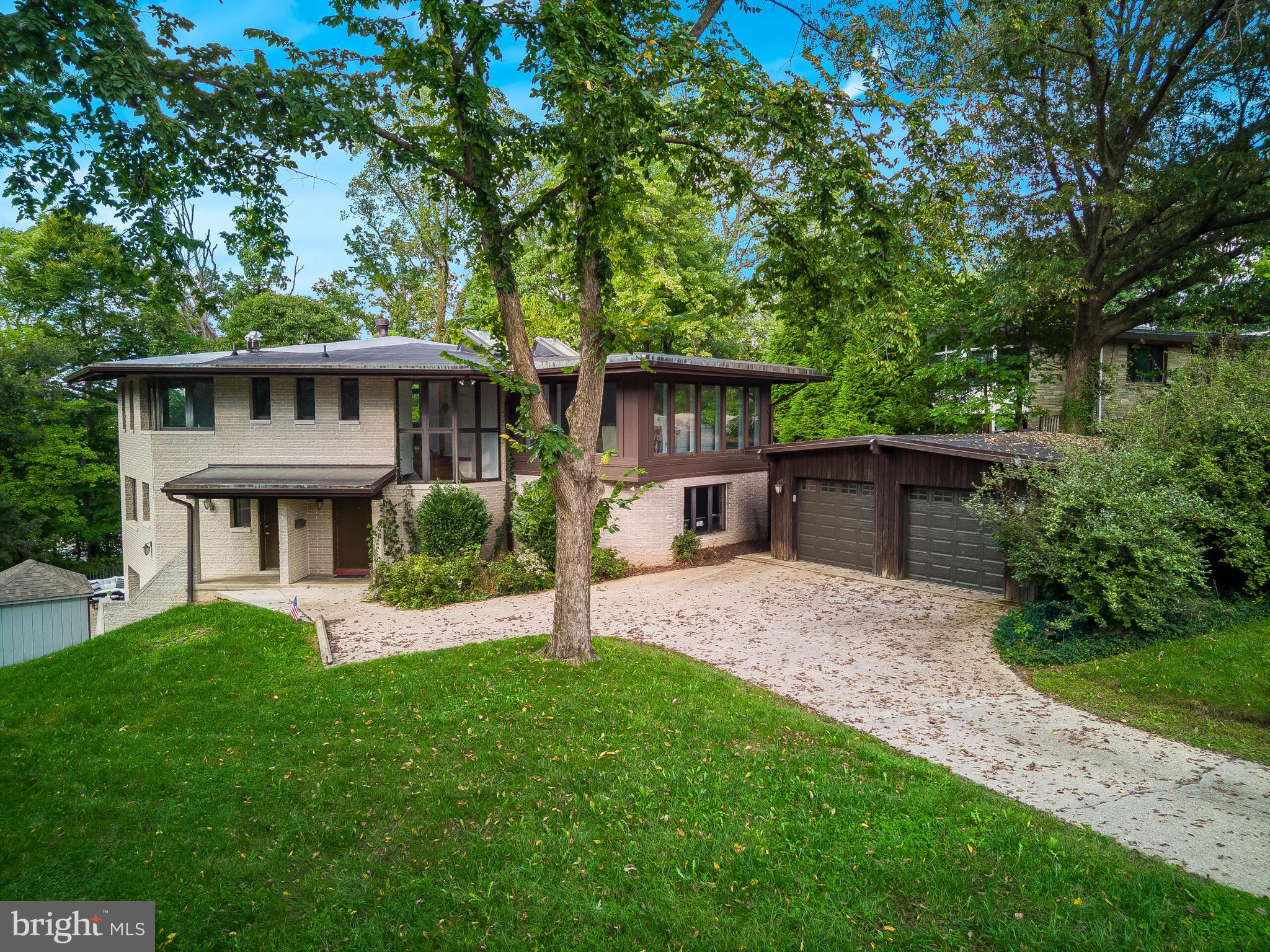 Contemporary masterpiece nestled on a quiet cul-de-sac with winter views of the George Washington Memorial Parkway, the Potomac River, and Washington, D.C. This rare gem boasts 5 bedrooms and 5.5 bathrooms. Step inside to discover a home of unparalleled elegance and modern sophistication. The main and upper levels feature rich hardwood flooring, beamed and vaulted ceilings, and skylights that flood the space with natural light. The gourmet kitchen is a chef's delight, equipped with tile flooring, granite countertops, a center island, upgraded stainless steel appliances, and stylish maple cabinets. Each upper-level bathroom is a sanctuary of comfort, featuring upgraded tile flooring, wainscoting, glass showers, and granite vanities. The lower level continues to impress with tile flooring, a versatile in-law suite complete with an Italian style kitchenette—stone counters, refrigerator, gas cooktop, oven, and sink—ideal for guests or extended stays. The expansive backyard , the huge patio and the a stunning wrap-around balcony are perfect for entertaining or simply unwinding, this balcony offers breathtaking panoramic views and seamlessly extends your living space outdoors.  Located approximately four miles west of downtown Washington, D.C., this home offers convenient access to shopping and dining, making it an ideal retreat for those seeking both luxury and location