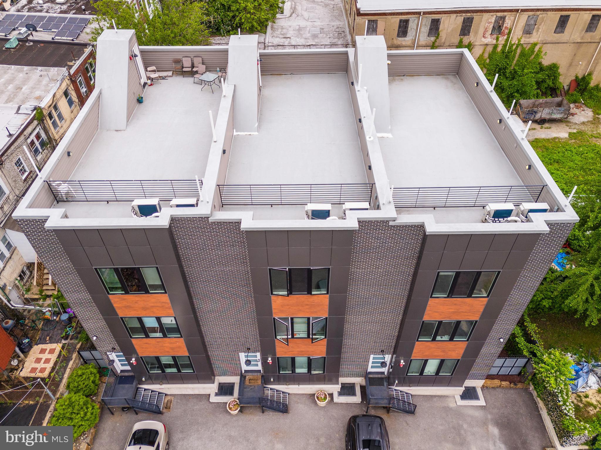 INTRODUCING: 85 EAST — This 9-unit gated new construction apartment community with parking is set back peacefully off the quaint cobbles of Germantown Avenue in Philadelphia’s historic Mount Airy neighborhood in NW PHL. It is a turnkey investment opportunity with an attractive 6% cap rate. Comprising 3 contiguous triplex buildings, 85 East features private parking and panoramic rooftop terraces for residents. Each building features two (2) 2bd x 1ba units on the 1st/2nd floors and one (1) 3bd x 2ba unit on the 3rd floor, with private access to the rooftop terrace. The interiors are outfitted with high-end finish kits including quartz countertops, LVP flooring, stainless-steel appliance packages, designer lighting and more. Bright, spacious and airy interiors provide a serene sense of calm inside the buildings. Walkable to Germantown Avenue’s commercial corridor lined with boutiques, shops, breweries, restaurants, cafes and historic structures, 85 East is connected to the fabric of Mount Airy’s eclectic lifestyle. Easy access into Center City and University City by train (3 minutes to Carpenter Station on Chestnut Hill West Septa line) or car (25 minutes to Center City), as well as suburban employment and entertainment districts. Walkable nearby amenities include: Mount Airy Tap Room, Acme, Lovett Memorial Library, Wawa, McMenamin’s, Jansen, Johnson House Historic Site, Weaver’s Way Co-op, Grocery Outlet, Young American Hard Cider and Tasting Room — as well as Wissahickon Valley Park, Chestnut Hill and Historic Germantown. 10 Year Tax Abatement—pay taxes on assessed land value rather than improvements. Minimal expenditures. High-growth rental submarket.