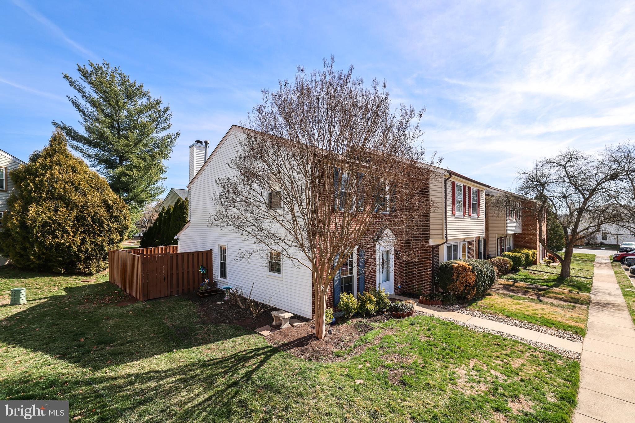 A beautifully renovated townhome in Fairfax County for under $500K!  Sought-after Newgate neighborhood is conveniently located close to major commuting routes: Rt. 28, Rt. 66, Rt. 29 and Rt. 50, while 18 minutes to Dulles International Airport.   Newer LVP wide-plank flooring on main and upper levels, kitchen with stainless steel appliances including 5-burner gas range, space saving built-in microwave, dishwasher and refrigerator; adjoining family room with recessed lighting, cozy wood-burning fireplace leads out to ground level deck and fully-fenced in landscaped yard.   Upper level offers primary suite with recessed lighting and en-suite renovated primary bathroom with frameless glass enclosure, updated vanity and lighting; second primary bedroom offers built-in shelving unit and renovated hall bathroom with newer vanity, tile and lighting.  And end-unit offers additional privacy!  Schedule your private tour today!
