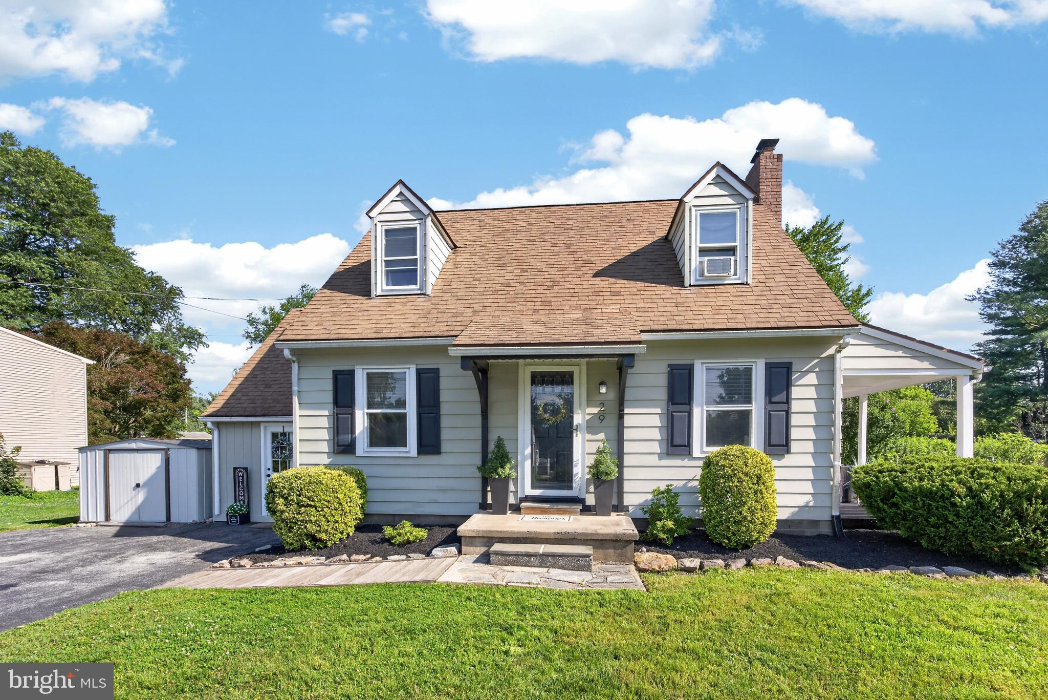 Showings begin at the Open House on Thursday, July 2, from 4:00 PM to 6:00 PM! Join us as we celebrate our nation's 250th birthday with hot dogs, popsicles, and refreshments while touring this wonderful home.  Welcome home to this charming and light-filled Cape Cod in desirable Sadsbury Township! Offering 2 bedrooms with the potential for a 3rd bedroom, this inviting home blends classic character with thoughtful updates. Step inside to discover refinished hardwood floors throughout and an abundance of natural light that fills every room. The refreshed kitchen features a double oven, reverse osmosis water filtration system at the sink, and access to the deck. The main level also includes a spacious dining room, a welcoming family room centered around a cozy wood-burning fireplace, and a versatile large bonus room that can easily serve as a third bedroom, home office, playroom, or hobby space. Upstairs, you'll find two comfortable bedrooms filled with Cape Cod charm, complete with built-in nooks and tucked-away storage spaces, along with a full bathroom. Outside, enjoy your own private retreat with a fully fenced backyard featuring a large deck, patio, and level yard—perfect for entertaining, gardening, pets, or play. Relax with your morning coffee on the inviting side porch, and take advantage of the storage shed for all your outdoor essentials. Washington Lane is full of charm and convenient to all family essentials.  Don't miss your opportunity to make 29 Washington Lane your next address!