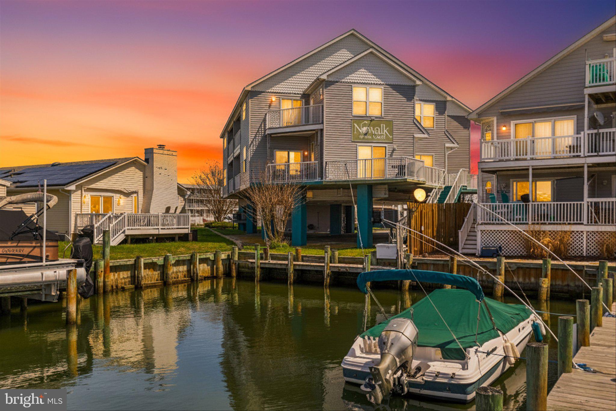 Welcome to 8901 Rusty Anchor Road #C, a rare opportunity to own a spacious 3 bedroom, 3 full bath condo in the highly sought after Little Salisbury neighborhood of North Ocean City.

Offering nearly 1,900 square feet across two thoughtfully designed levels, this home delivers the space, layout, and flexibility that is so hard to find at the beach. The main level features a bright and open living area along with a full bedroom and bathroom, perfect for guests or easy one level living. Upstairs, you will find two additional bedrooms, each paired with their own full baths, creating ideal separation and privacy for owners and guests alike.

What truly sets this property apart are the three oversized balconies, each offering incredible bay and canal views. Whether you are starting your morning with coffee at sunrise or winding down in the evening with a sunset, this home gives you front row seats to both.

This property is being sold fully furnished, making it completely turnkey and ready for immediate enjoyment or rental income just in time for the summer season. The property also comes with 2 assigned parking spots and one of them is covered. The cherry on top...the outdoor shower and pier that can be used to launch your kayak or paddleboard right from your back yard. 

The home has been well maintained and thoughtfully updated, including Cortec flooring, a newer roof completed between 2018 and 2019, and major systems such as HVAC, water heater, refrigerator, and dishwasher all updated within the last seven years. Built in 2004, the home combines modern construction with generous square footage rarely found in today’s condo market.

For those looking at investment potential, this unit is currently part of a rental program and averages between $22,000 and $25,000 during the summer season, making it an excellent opportunity for both personal enjoyment and income generation.

Location is everything, and Little Salisbury continues to be one of North Ocean City’s most desirable communities. You are just moments from some of the area’s favorite spots including Liquid Assets and Coffee Bean, as well as the 94th Street Art League. Outdoor enthusiasts will love the nearby tot lot, dog park, basketball and tennis courts, all within close proximity. Daily conveniences are just around the corner at ACME Markets, and beach days are effortless with easy access points nearby.

Additional features include assigned parking and a private storage closet, perfect for keeping all of your beach gear organized and accessible.

If you have been waiting for a larger condo with views, location, and proven rental performance, this is the one you do not want to miss. Come see for yourself what all the fuss is about living on 94th Street corridor!
