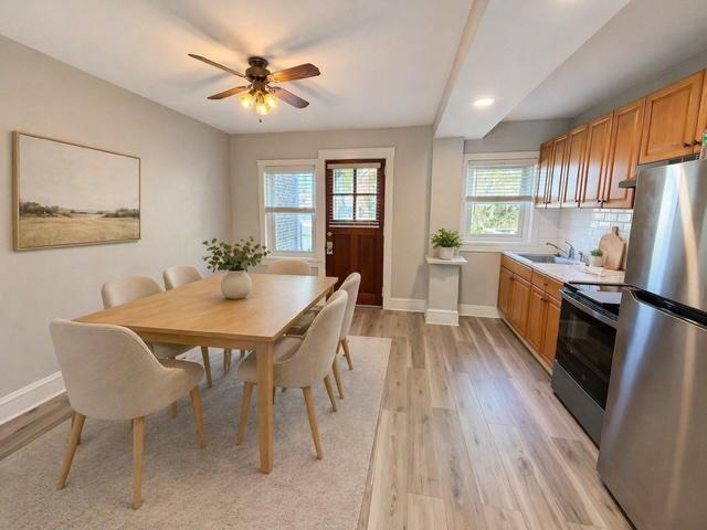 Bright, fresh, and move-in ready, this Union Park Gardens townhome welcomes you with brand-new carpet and fresh paint throughout. Enter through the charming enclosed front porch into a spacious living room filled with possibility. The eat-in kitchen has been refreshed with new flooring and offers a comfortable space for everyday meals and gatherings.
Out back, enjoy a generously sized yard—perfect for entertaining, relaxing, gardening, or creating your own outdoor oasis. Upstairs, you’ll find two freshly painted bedrooms offering clean, comfortable retreats.
Located in desirable Union Park Gardens, this home is ready for its next chapter. Some photos have been AI virtually staged to help buyers visualize furniture placement and design possibilities.
