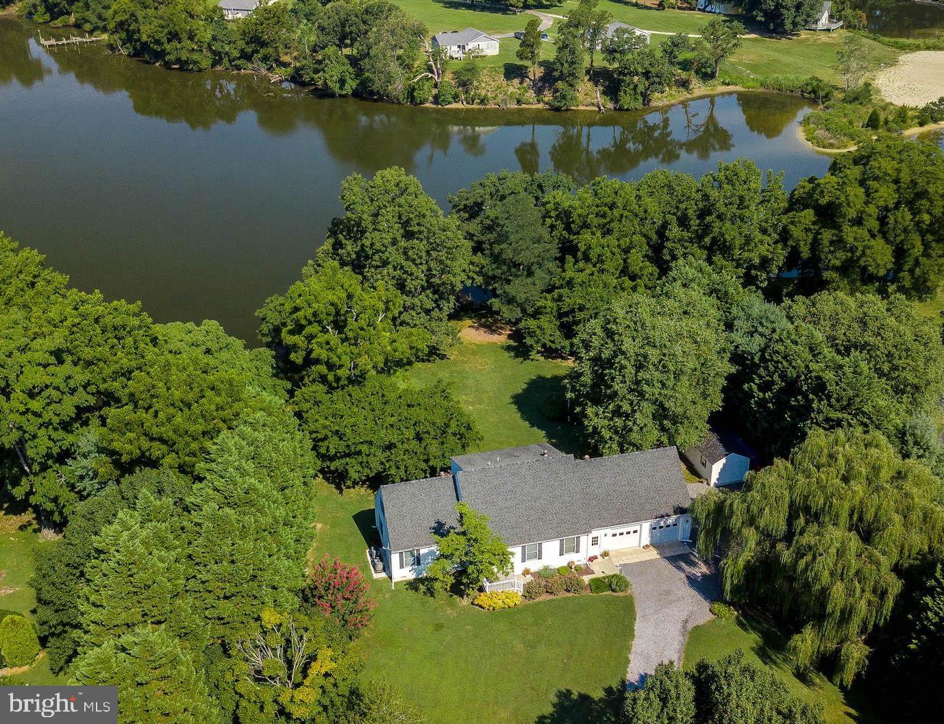 WATERFRONT! Large cape cod overlooks Little Kingston Creek. Protected sailboat depth water w/ water and electric boat lift & jet ski lift. Master bdrm on main level, second master upstairs w/ separate entrance! Great for In-law situation. Bonus room above garage. Granite counter, gas stove for cooking, Back up generator Oversized 2 car garage. All setting on over an acre of land. Minutes the Patuxent River to Solomons Island. Close to shopping and Pax River Naval Air Station.