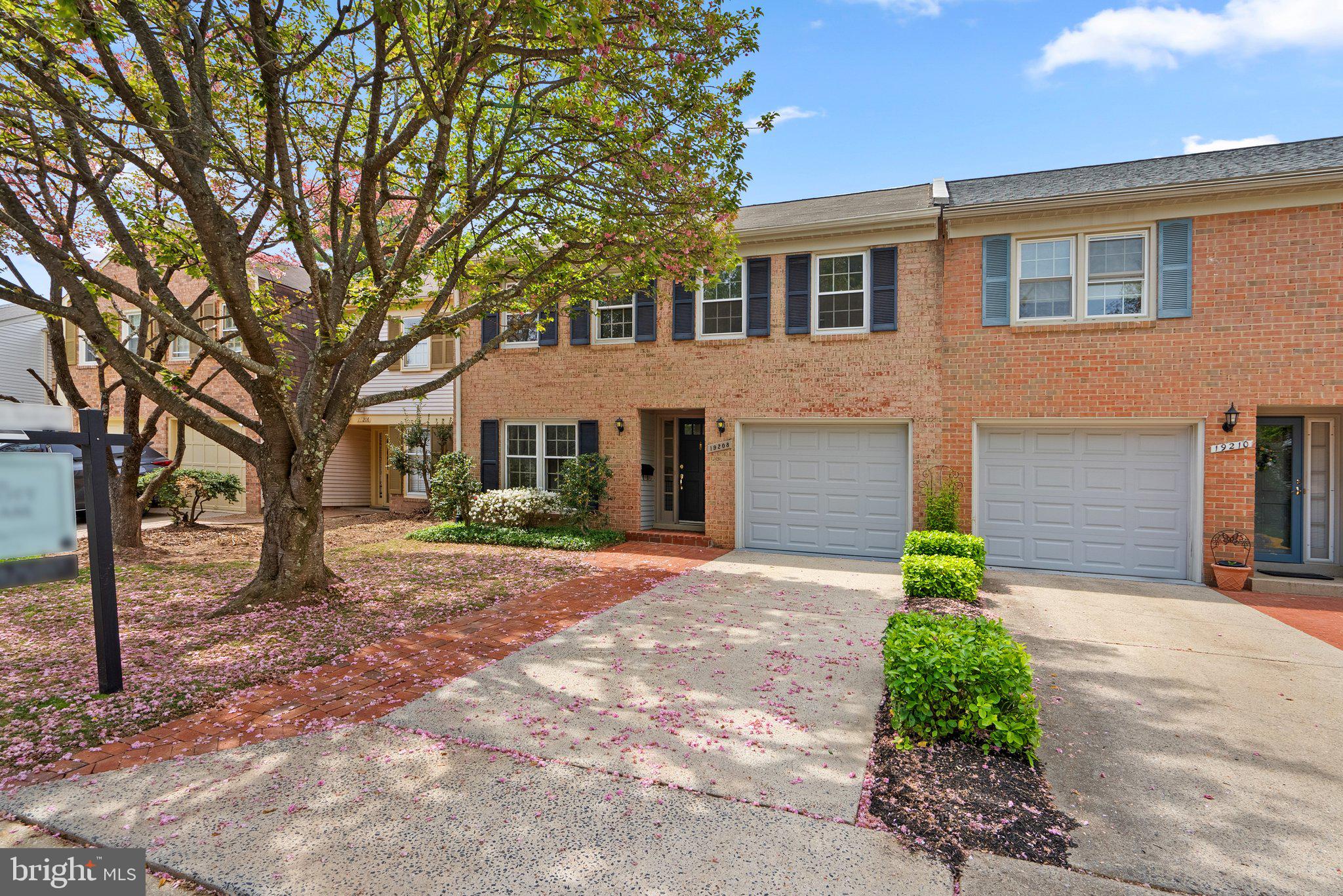 Nestled in a quiet, well-kept neighborhood on a serene cul-de-sac, this beautiful brick townhouse offers warmth, style, and functionality. The charming brick exterior and welcoming brick walkway set the tone before you even step inside. The main level greets you with gleaming hardwood floors and a spacious, open-concept layout—perfect for everyday living and entertaining. The formal living room flows seamlessly into the dining area, connected by a stylish wet bar—an ideal setup for hosting guests. Large windows throughout bathe the space in natural light, highlighting the updated carpeting and tasteful finishes. The updated powder room adds convenience and modern flair. The kitchen is a standout with refreshed cabinets featuring decorative trim, new hardware, a sleek updated sink and faucet, and generous countertop space. The farmhouse chic vibe is complemented by exposed wood beams that add warmth and character while providing sightlines to the cozy family room. A sliding door opens from the family room to the fenced-in backyard, where a brick patio and walkway lead to a tranquil common green space—perfect for relaxing or entertaining under the trees. The garage has been thoughtfully updated with fresh paint, ample shelving, and smart storage solutions. Direct access to the kitchen makes bringing in groceries a breeze. Upstairs, you’ll find four generously sized bedrooms and two full baths. Fresh carpet and paint throughout, along with updated door hardware, make the upper level feel fresh and inviting. Three of the bedrooms feature large windows and walk-in closets, and the updated hallway bath adds modern convenience. The spacious primary suite overlooks the tranquil green space and offers a large walk-in closet and a updated en-suite bath—your perfect private retreat. Two large linen closets provide plenty of storage for the whole household. The partially finished basement offers a huge open space—an ideal blank canvas to customize to your needs. Whether you envision a playroom, game room, home gym, or extra entertainment space, there’s room to bring your ideas to life. The laundry area includes a laundry tub and has plenty of potential to create a functional mudroom or utility area. Organized shelving under the stairs adds additional storage space to the home. Tucked away on a quiet cul-de-sac in a beautifully maintained neighborhood, this brick-front townhouse offers the perfect blend of style, space, and comfort. Mature trees line the street and sidewalks, creating a peaceful, walkable setting just minutes from Watkins Mill recreational area. With multiple living areas, its unique chic modern farmhouse touches, seamless flow, abundant natural light, and a layout designed for both everyday living and entertaining, this home is a rare find. The peaceful setting, spacious interiors, and stylish updates make it move-in ready—and a place you’ll love to call home.
