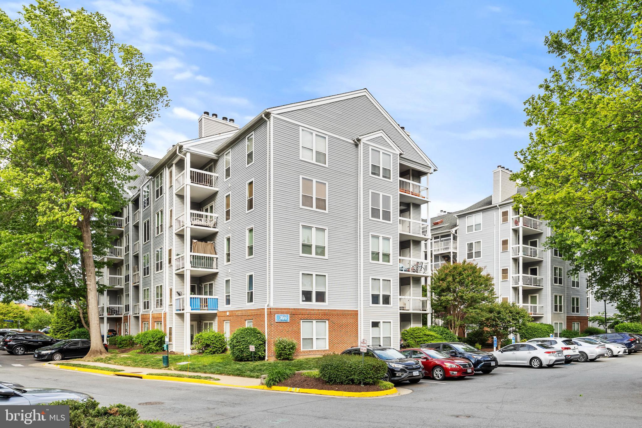JUST LISTED! Bright and open *TOP* level condo in excellent move-in ready condition! This rare floorplan features a gated private patio entrance seen on few others. Gorgeous bamboo flooring and fresh neutral paint throughout. Brand new carpeting! Bedroom with huge walk in closet.  Washer and dryer in unit. Spacious bathroom. Kitchen with stainless appliances and granite counters. Condo amenities feature swimming pool, grilling area, community garden and well equipped gym/ fitness center. Great location with easy access to shopping, dining, parks, 66, Metro and bus stop. Schedule your showing today!
