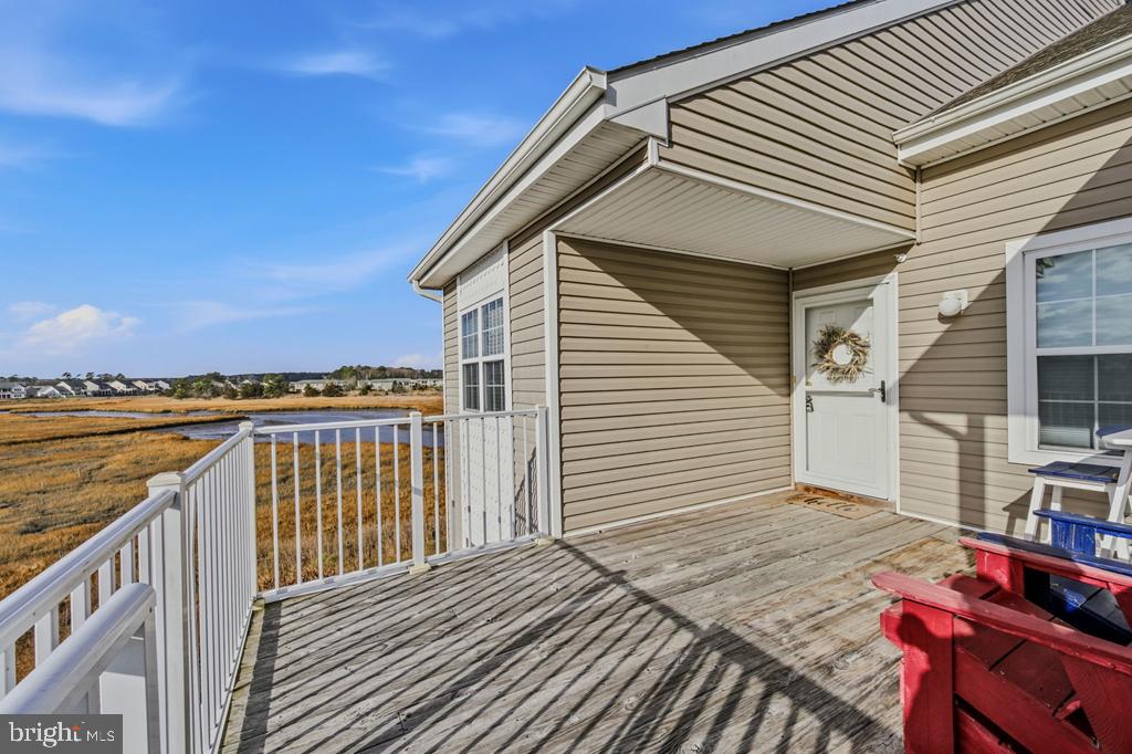 Welcome to this stunning contemporary top-floor corner condo in Ocean View, DE, offering some of the most breathtaking views in all of Bethany Bay. This expansive residence offers generous square footage, creating a spacious and open layout rarely found in coastal properties. The unique 1.5-level design showcases sweeping water and landscape views from both floors, filling the home with natural light and an impressive sense of scale. 
 
The heart of the home is the beautifully appointed kitchen, featuring granite countertops and stainless steel appliances, ideal for both everyday living and entertaining. Adjacent to the kitchen is a spacious dining room that overlooks incredible bay views, making every meal feel like a special occasion. 
 
The living room is a true showpiece, featuring a cozy fireplace framed by large windows that capture breathtaking, unobstructed bay views. This inviting space flows seamlessly to the private balcony, offering yet another vantage point to enjoy sunrise coffees and unforgettable sunsets over the water. 
 
Each of the four oversized bedrooms is thoughtfully designed for comfort and privacy, and every bedroom includes its own full bathroom, making this home ideal for guests, family, or multi-generational living. 
 
Additional highlights include a 1-car detached garage, offering plenty of space to park a car or SUV while also providing storage for coastal essentials such as kayaks, bikes, beach gear, and a grill. 
 
Residents of Bethany Bay enjoy an impressive array of resort-style amenities, including a championship golf course, community pool, tennis courts, a basketball court, and a fully equipped fitness/workout facility—providing something for everyone, whether you’re seeking relaxation or an active lifestyle. 
 
Conveniently located just 5 minutes from shops and restaurants and 10 minutes or less from Bethany Beach, this home places you in the heart of coastal living. 
 
This is a rare opportunity to own a spacious, top-floor corner condo with panoramic views, upscale finishes, private en-suite bedrooms, and access to exceptional amenities. Schedule your private showing today and experience the very best of Bethany Bay living.