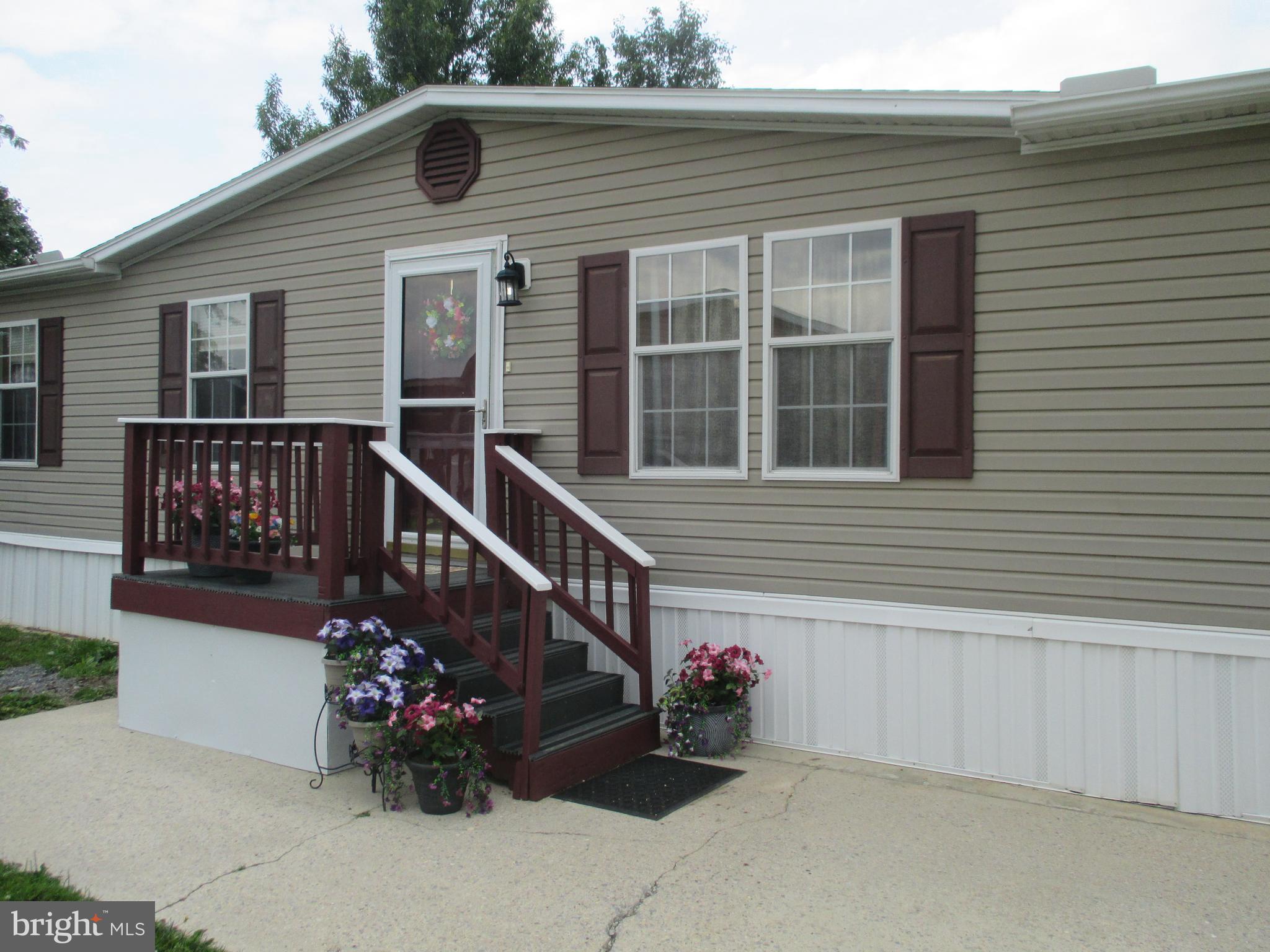 Seller has spared no expense to make this YOUR home!  Perfect One-Level Living in a Prime Location!  Lots of room in this one - 1,900+ sq.ft.!  Discover the ease of single-level living in this beautifully maintained ranch-style home-3 Bedrooms, 2 full baths.  Tucked away in a quiet cul-de-sac this expansive oversized double wide home perfectly balances privacy with community convenience.
Inside, the bright and airy open-concept floor plan boasts soaring 8'+ ceilings throughout. The heart of the home features a spacious fully equipped kitchen with island and abundant cabinet storage.  A charming breakfast nook and office space flow seamlessly into a family room designed for effortless entertaining. Cozy up by any of the home’s 3 fireplaces, strategically placed for maximum comfort.
The thoughtfully designed layout includes generously sized bedrooms, highlighted by a primary suite complete with double sinks and a large garden tub.
Peace of Mind: Meticulously cared-for property with the roof replaced in 2008.  Low outside maintenance with 2 trec decks and extra storage shed.  
Prime Location: Enjoy unbeatable proximity to local schools, shopping hubs, and dining, with an easy commute to Harrisburg, Gettysburg, and beyond.

Turn-Key Ready: Vacant and primed for quick possession.
Schedule your tour today to experience this rare combination of size, layout, and location!