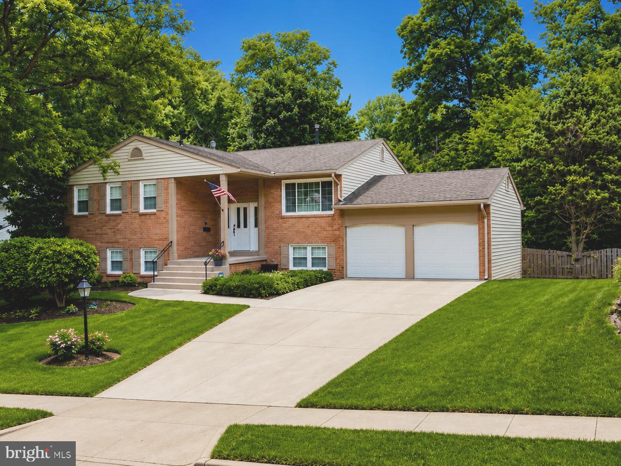 Beautifully updated split-level home in the highly desirable West Springfield area with NO HOA! Tucked away at the end of a quiet street with no through traffic, this private setting offers both comfort and convenience. This light-filled home features 5 bedrooms (3 on the main level and 2 on the lower level) and 3 full bathrooms. Recent updates include fresh paint, a remodeled kitchen, newer stainless steel appliances, updated bathrooms, and beautifully refinished hardwood floors throughout the main level.

The spacious finished lower level offers a cozy fireplace, custom bar area, and plenty of space for relaxing or entertaining. Step outside to a large deck overlooking the private backyard, complete with a low-maintenance hot tub—perfect for year-round enjoyment. Conveniently located near parks, shopping, dining, and major commuter routes. A rare opportunity in an exceptional West Springfield location! Don't miss it!