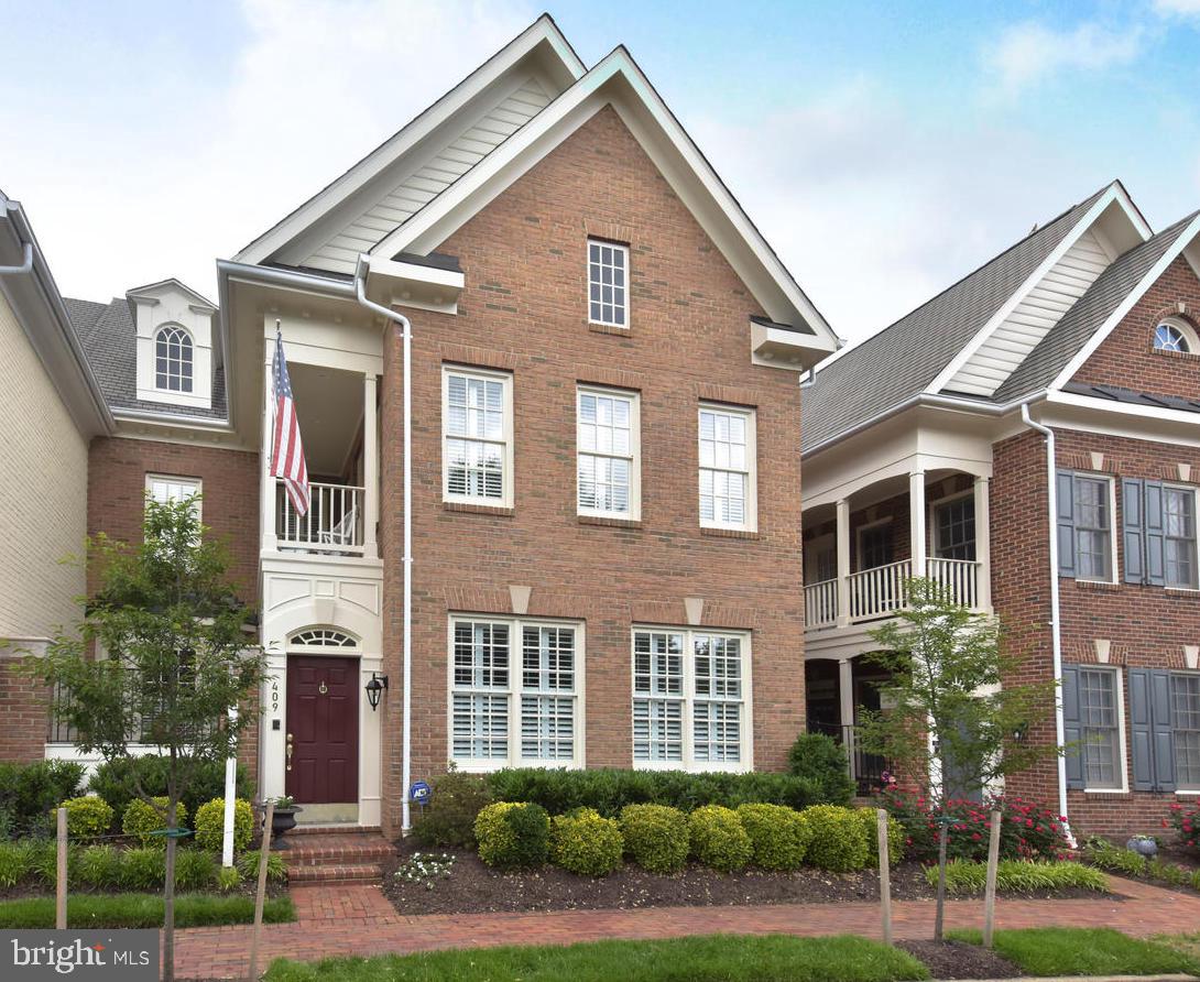 ONE OF A KIND... OVER $200,000 INTERIOR AND EXTERIOR IMPROVEMENTS...In the heart of Old Town Alexandria...just blocks to the METRO and the Waterfront!   OLD TOWN VILLAGE incredible space for Old Town 32' wide, architecturally-unique, 2-level, Charleston-style townhouse that feels like a single-family home!. This home boasts a renovated  kitchen with the addition of a wine room with Magic Chef cooler and beverage refrigerator and pantry, a luxurious master bath remodel with Thermasol, over-sized steam shower that make it one of a kind.  The chef's kitchen with the enlarged granite island provides entertaining space and storage, GE Profile and Bosch stainless appliances, Plantation shutters and more. Gleaming hardwood floors, fabulous moldings, exquisite custom built-ins, family room with porcelain feature wall and Dimplex Prism, liner electric fire place is sure to please.  All this plus 2 courtyards, covered balcony, as well as a 2-car garage, an even greater rarity in Old Town. Location benefit a city sticker for additional street parking.  OLD TOWN VILLAGE is a real jewel, partially-gated with modern amenities (salt water pool, hot tub, exercise room, party room, library and tot lot) within blocks to shops, fine dining, Metro, Whole Foods, Carlyle/PTO, the waterfront and near all major commuter routes. This home has been impeccably maintained and is better than new. 409 S Henry Street (Not Route 1 it's a quiet side street).  OLD TOWN VILLAGE.....OLD TOWN CHARM.... Exceptional neighborhood amenities! IMAGINE a place where Colonial, Georgian, and Victorian homes are joined by brick sidewalks reflecting the rich architectural style of Old Town.  IMAGINE a place where you meet neighbors as you stroll down the street, relax on a bench outside the community clubhouse, browse the wares of shops, enjoy the waterfront activities or a meal at a neighborhood cafe. IMAGINE a place where neighbors socialize; volunteer in the community; and help each other in times of crisis. Old Town Village consists of 116 Four story townhomes and 39 Two Story homes plus 125 condominiums. Located in the heart of Old Town, the Village is a community of people who care about each other and the community they occupy.  ISN'T THIS JUST THE RIGHT COMBINATION FOR YOUR NEW HOME?