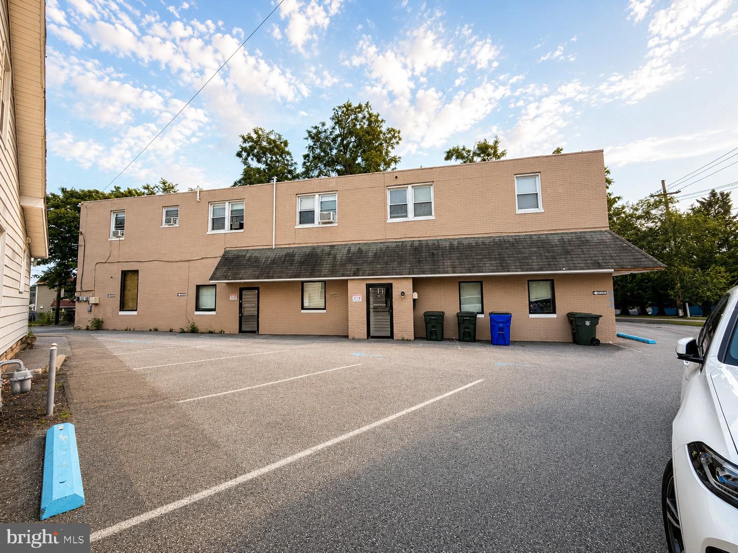 Prime Corner Location just behind the new Hagerstown SportsPlex/Field House! This exceptional mixed-use property offers outstanding investment potential with 3 income-producing residential apartments, 12 parking spaces, and 2 garages.

The expansive first floor features 6 private office/exam rooms, 4 half bathrooms, and a kitchen. Previously operated as a daycare and, before that, as a medical office, this versatile space is ideal for a wide range of commercial uses, including professional offices, medical practices, educational facilities, and more. It may also offer the opportunity to be converted into additional residential units, subject to buyer verification and approval. Buyers are encouraged to perform their own due diligence with the City of Hagerstown regarding zoning, permitted uses, and redevelopment possibilities.

The upper level consists of 3 residential apartments, providing immediate rental income and multiple revenue streams. The building is also equipped with a sprinkler system, adding value and flexibility for future use.

Located in one of Hagerstown's fastest-growing commercial and entertainment districts, this corner property offers excellent visibility, easy access, and tremendous long-term appreciation potential. Whether you're an investor looking to expand your portfolio, an owner-occupant seeking business space with rental income, or a developer exploring future opportunities, this property delivers exceptional versatility and value.

Don't miss this rare opportunity to own a high-income mixed-use property in one of Hagerstown's most desirable growth areas!