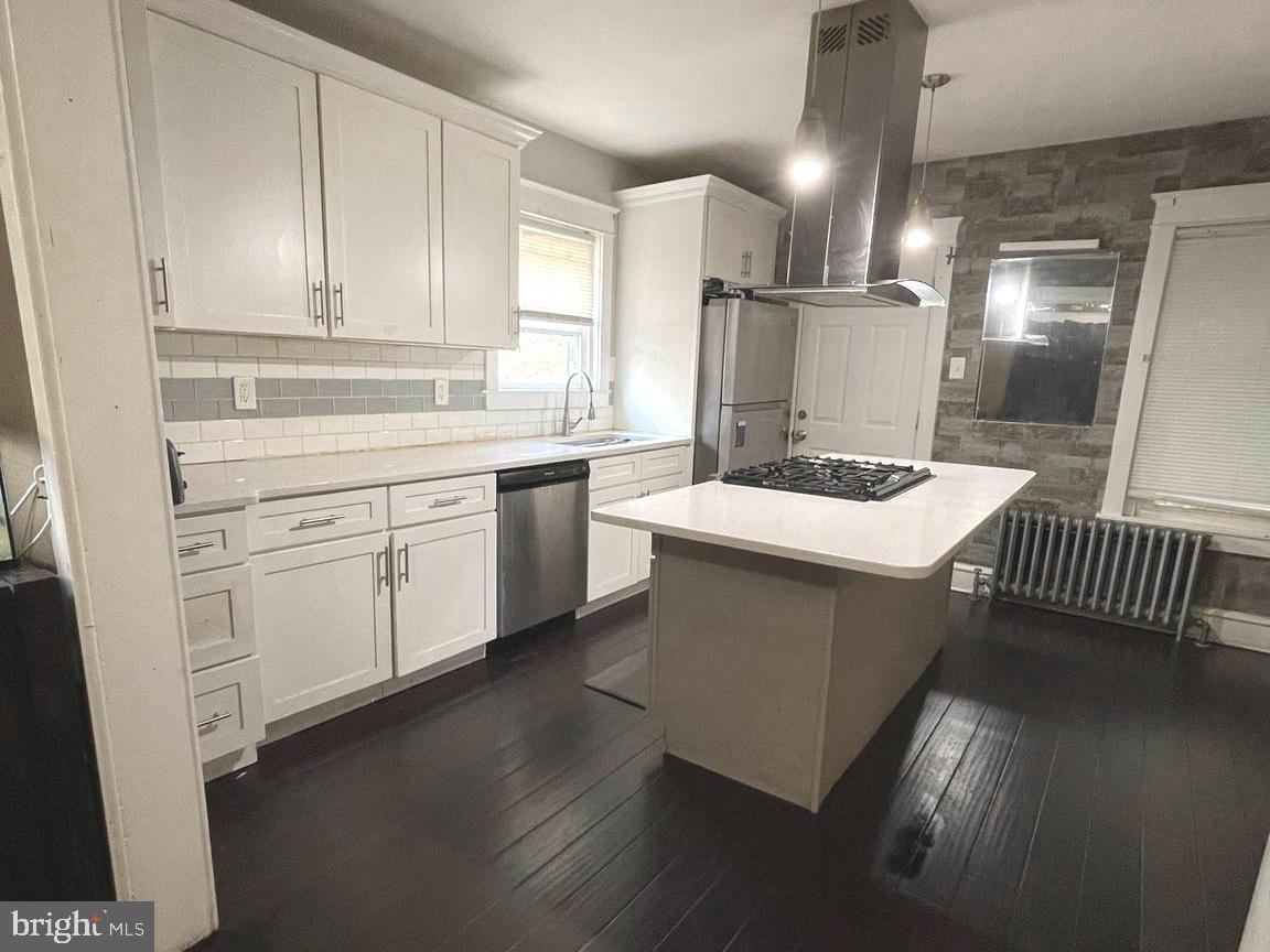 Bring All Offers! Motivated Seller!
Located in the desirable Governor Mifflin School District, this 3-bedroom, 1.5-bath home offers a fantastic opportunity for a buyer or investor ready to bring their vision to life. Now mostly vacant and being refreshed, the home shows with a more open feel and improved flow, making it easier to truly appreciate the space and potential throughout.

The eat-in kitchen features stainless steel appliances, white shaker cabinetry, a large sink, and a quartz-top island with a slide-in gas range and stainless vent hood—offering a modern foundation ready for your finishing touches. Dark bamboo flooring extends throughout the main level and into the lower-level family room, creating a warm and contemporary feel.

Enjoy multiple outdoor living areas including an upper rear porch, lower deck, and additional side yard, providing a private and secluded setting with plenty of room to relax or entertain.

With a little cosmetic updating and fresh paint, this property has the potential to truly shine. Whether you're a first-time buyer looking to build equity or an investor searching for your next opportunity, this home offers strong potential and value.

Property is being sold in its present condition.