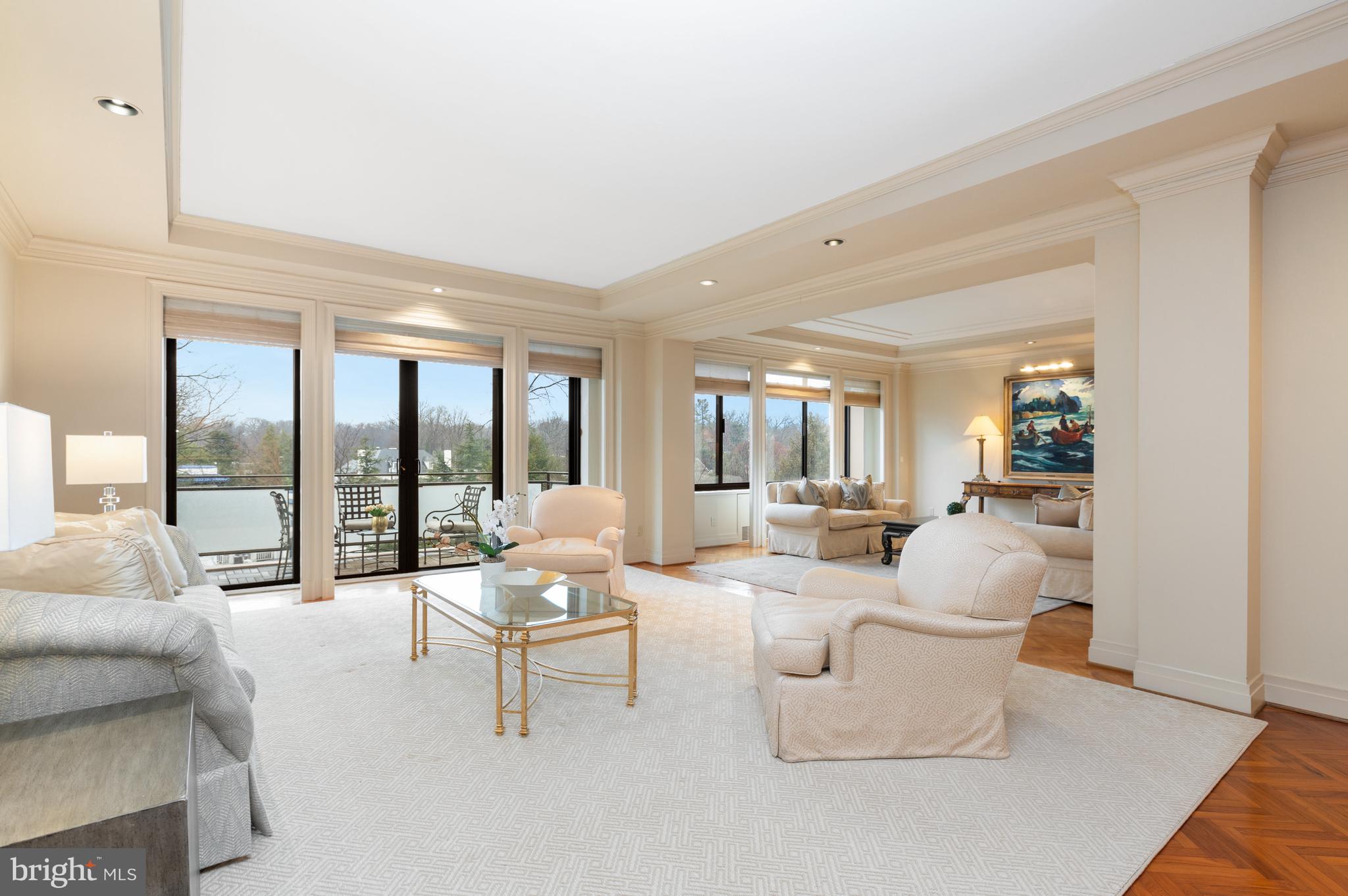An  extraordinary 4,600+ sq. ft. residence conveys with four parking spaces at the Shoreham West Cooperative Apartments. The building is designed by the renowned Emery Roth & Sons and epitomizes privacy, luxury and sophistication. This home's expansive living spaces are flooded with natural light from large east and west-facing windows  creating an airy, inviting atmosphere.  Upon entering, a private vestibule opens to a grand foyer with tray ceilings, exquisite stone flooring and detailed moulding, setting the tone for the entire residence. Meticulously crafted herringbone flooring  add timeless elegance to the living and entertaining spaces.   Art collectors will be thrilled to discover designated art lighting throughout. This residence is designed to wow your guests at every turn.

The double  living room is perfect for hosting and connects to a butler’s pantry. Double-insulated sliding glass doors open to a private, covered balcony, seamlessly extending your gatherings outdoors. A wood-paneled library provides a serene retreat, while the primary suite offers dual bathrooms and four walk-in closets. With abundant closet/storage space throughout and meticulously crafted built-ins, this home effortlessly combines opulence with artisanship.

On the east side of the grand foyer, the chef’s kitchen is a true standout, offering new Thermador appliances, a Sub-Zero refrigerator, generous cabinetry/granite countertops, prep/bar/utility sinks and an island for casual dining. For larger gatherings, the dining room, sunroom and flex area provide ample space to hold a sit-down dinner for at least 30, while a second balcony offers the perfect extension for outdoor entertaining. 

A well-appointed in-unit laundry/utility room, an adjacent storage closet and two storage areas convey.   The Shoreham West offers impeccable service including: 24-hour concierge, front doormen, onsite manager and building engineer,  a wine room, rooftop deck/community room/gym, art studio, internet, pet and car washing stations, laundry room with oversized washer/dryers etc.

The building is pet friendly and boasts an ideal location within walking distance of the Woodley Park Metro Station, just minutes from the Kennedy Center and the downtown business district. Located next door to the Omni Shoreham Hotel, enjoy their spa and outdoor pool facilities while reserving guest rooms when needed.