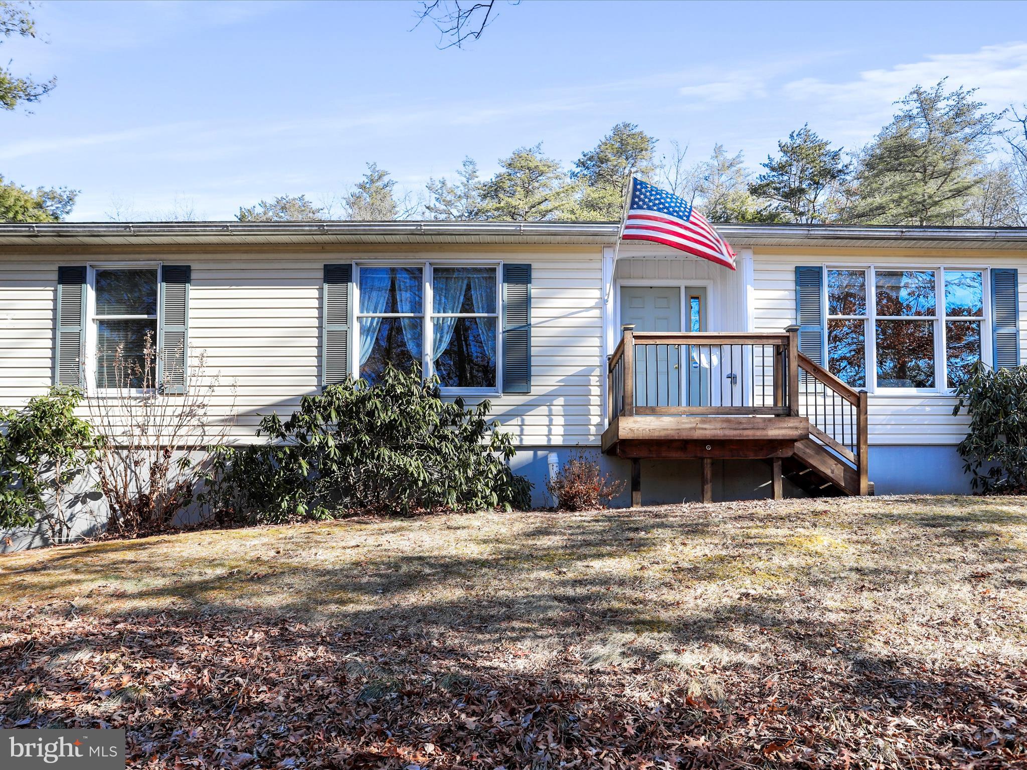 Natural light fills this beautiful ranch style home on 14 acres of wooded land- Adjacent to Green Ridge State Forest! Pride of ownership shows in every room.  This one-owner home was built in 1999. Enjoy the ease of one level living- Main level consists of 3 Bedrooms/2 Baths including a large primary bedroom suite -- Lovely kitchen with breakfast table space-Formal dining room-Spacious living room-Entry hall with closet-Laundry on main level.  Two sets of French doors lead out to the deck, from the living room and the primary bedroom, Views of wooded privacy from every room.  Full tall basement with Superior walls foundation can easily be finished and offers 1700 additional square feet. All appliances are included. Newer heat pump and water heater. Generator hookup. Deck was replaced 5 years ago. 
 Roof shingles are TAMKO Heritage 40 year architectural shingles. Survey of property is on file.  Here you can hunt and hike in the quiet of the forest. Make your appointment today!