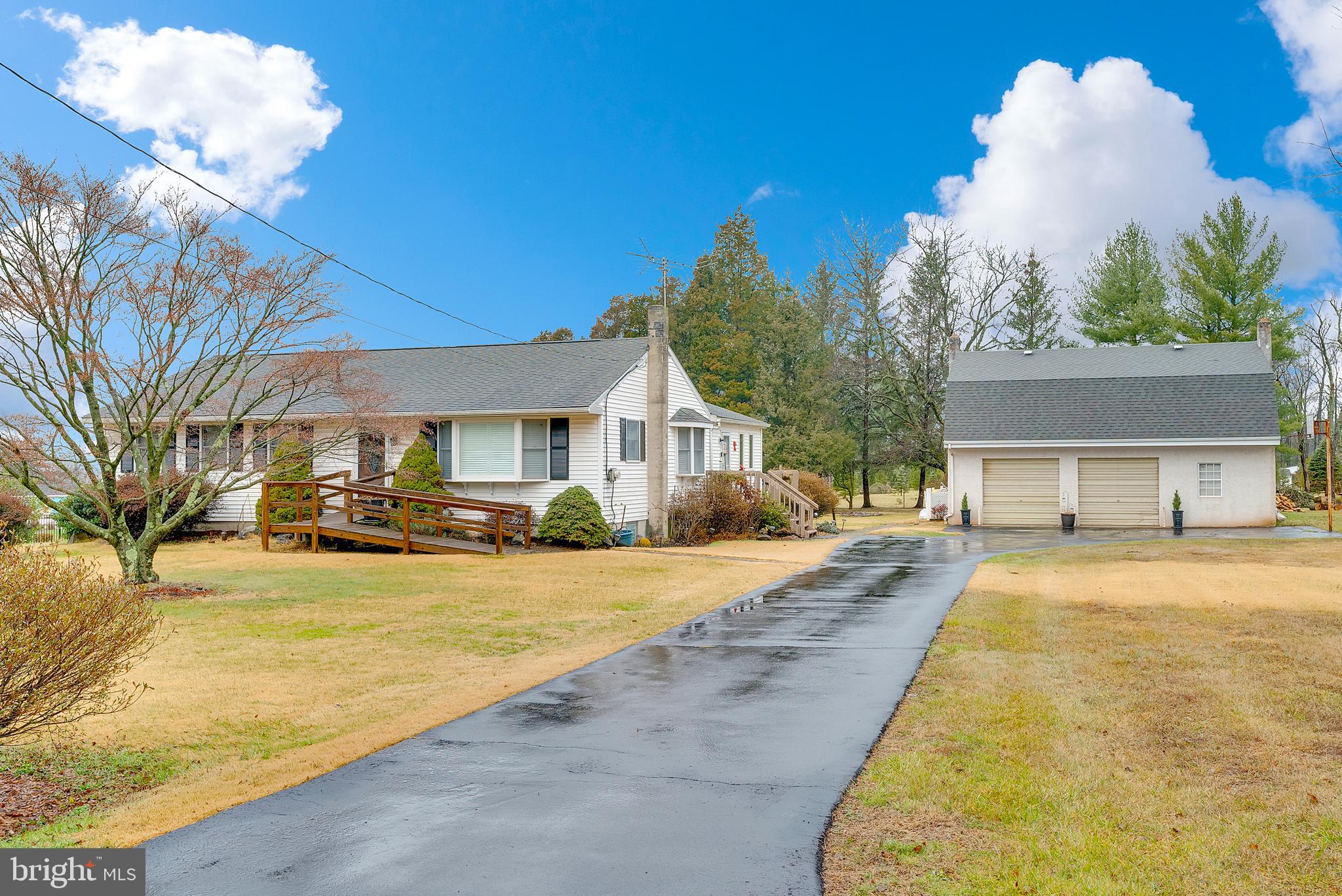 Don’t miss out on this beautiful 3 bedroom/ 2 bathroom Rancher situated on 1 acre in scenic Skippack Township. The main level offers the full kitchen with double wall oven, built in microwave and plenty of countertop and cabinet space. The kitchen flows directly into the breakfast /dining room with hardwood floors, bay window with upgraded shutters & upgraded wood trim work. The kitchen also offers French doors leading to the bright & sunny family room with plenty of natural lighting, raised ceiling & two sets of sliding doors to the rear deck. Seller has enjoyed many days & nights in this family room overlooking the wonderful setting. The main level also offers the formal living room with hardwood floors, neutral décor, bay window and plenty of room for the large screen TV. The center hallway leads to two guest bedrooms with hardwood flooring, updated hall bathroom and continues to the main bedroom suite, which includes hardwood floors and updated full bathroom. The primary bathroom includes a granite top vanity, tiled shower/tub and recessed lighting. The walkout basement includes a partially finished playroom area and large storage room & workshop. For those “Car enthusiasts” you will love the oversized two car garage complete with high ceilings, workshop area and the spacious walk-up 2nd floor area that could be finished into more living space or other endless possibilities. The beautiful setting backs to trees and the local tree farm. This terrific yard offers plenty of room to play & entertain.
