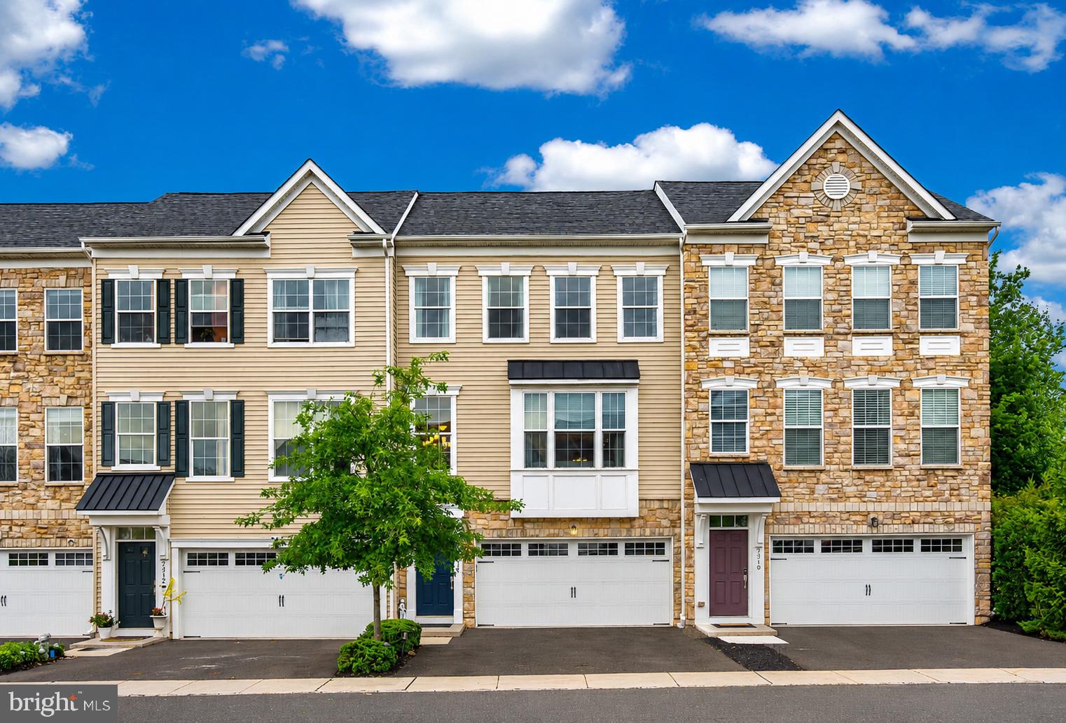 Welcome to this stunning former model home located in the High Grove community, within the Central Bucks School District. Move-In Ready!! As you enter through the front door, you’ll be greeted by 9-foot ceilings, engineered hardwood floors, upgraded carpeting, and recessed lighting throughout. The spacious open layout, complemented by numerous windows, ensures that the rooms are filled with natural sunlight. The open and bright main level features seamless flow and multiple living spaces. The kitchen is equipped with an enlarged granite center island, elegantly upgraded white cabinets, stainless steel appliances, backsplash, and granite countertops. Adjacent to the kitchen, dining area, and bump-out sunroom with a large sliding door leading to the maintenance-free composite deck with an elevated view. This level also included a large open family room, a powder room, and a luxurious sitting area. The upper level offers the primary suite with a cathedral ceiling, two walk-in closets, a possible sitting area, and a luxury primary bath with decorated tile, a soaking tub, a stall shower, and a double vanity with a granite sink top. This level includes two additional bedrooms, a full hall bathroom, and a convenient second-floor laundry. The lower level features a finished walkout with engineered hardwood floors and upgraded carpet. It includes an entertainment and exercise room, a fourth bedroom, and an upgraded full bath. This area provides a private space for guests or an office, with access to the private patio and garage, making it very versatile. The two-car garage and ample parking spaces enhance the home's appeal. This home is conveniently located near shops, restaurants, and major roadways, including the PA Turnpike and Route 611. Easy to show! Schedule your showing today!