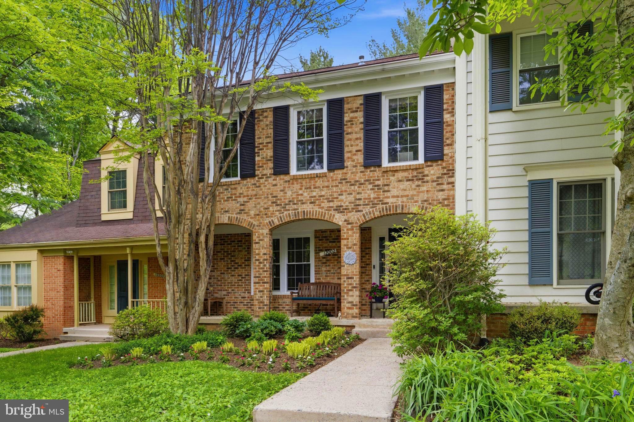 1st OPEN HOUSE:  Saturday May 2nd & Sunday May 3rd: 1:00-3:00. A Must See! 
3BR, 3.5 Bath Brick Townhouse with Contemporary Interiors in Sought After Fallsberry Community in Potomac,. Private Lot backs to wooded area with hiking path.  Meticulously maintained and cared for by the  owners. In immaculate  condition, this home offers so much for you to enjoy, including: Recently Refinished Wood Floors on the main level, and wood floors on the top floor in the BR's,  entire house freshly painted, All New Windows Throughout, updated Extra Large Eat in Kitchen in 2025, including new floor, Mandarin Cherry Red Cabinetry,  Stainless Steal Appliances w/ New Electric Smart Oven/convection oven with WiFi capability. All Custom built closets in BR's,  recessed lighting throughout, Entry Foyer with Coat Closet and updated Half Bath, Cathedral Ceiling in the sunken living area, with Skylights, brick fireplace with built in Shelves  and sliding doors to the deck with wooded views, Open Floor plan with separate dinning area, allows for great flow and lots of light! The Primary BR on the second floor has large Ensuite Bath and Cathedral Ceiling with Ceiling Fan,  and separate loft sitting /office area,  the Second Bath recently updated with updated Modern Fixtures, leads to the 2nd BR with Ceiling fan and Recessed Lighting,  The Recreation Room Located on the lower walk out level with sliding glass doors that open to wooded area, includes a 2nd brick fireplace Flanked by floor to ceiling built in Shelves,  2 large storage closets in the hallway, a laundry room w/ plenty of storage, & a 3rd BR w/ Updated Full Bath and linen closet adjacent to the Bedroom. there are 2 assigned parking spaces right in front of the house and a nice front deck with mature landscaping.  The location is convenient to Park Potomac, Cabin John and Potomac Village with easy access to 270 and the beltway. Truly a Spectacular Home waiting for the next owners. Offers due Tuesday at noon.