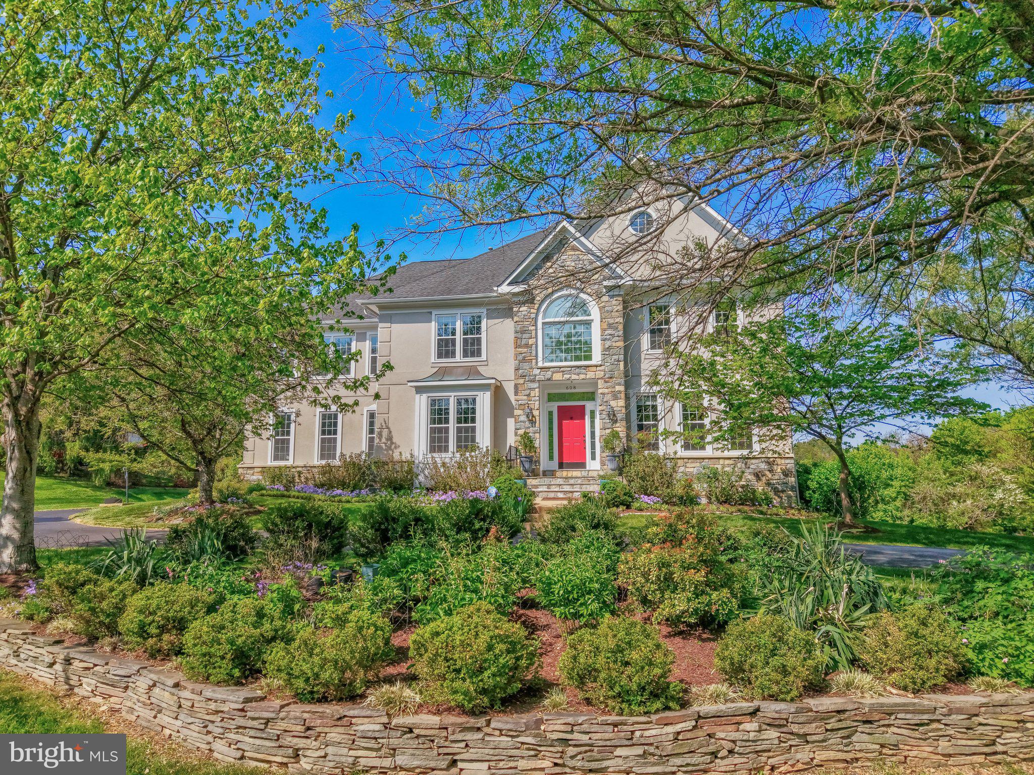 Nestled within the prestigious Ridings of Great Falls, this exceptional Renaissance-built Colonial offers a rare blend of timeless elegance, modern upgrades, and resort-style living on 1.72 private acres. This meticulously maintained estate delivers over 7,000 square feet of refined living space designed for both grand entertaining and everyday comfort.

A striking stone and stucco exterior sets the tone, while inside, a dramatic two-story foyer and soaring family room welcome you with abundant natural light, rich hardwood flooring, and a graceful spiral staircase. The thoughtfully designed layout flows seamlessly into a chef’s gourmet kitchen, fully renovated and equipped with high-end cabinets, updated cooktop, double ovens, an oversized island, and a butler’s pantry—perfect for effortless hosting.

The main level features elegant office, formal living and dining room, along with a sunlit breakfast area overlooking beautifully landscaped grounds. The inviting family room, centered around a dual-function fireplace, creates a warm yet sophisticated atmosphere.

Upstairs, four generously sized bedrooms and three bathrooms include a luxurious primary suite with large sitting room, featureing a gas fireplace, beautiful tree and garden views from large windows, offering a spa-inspired retreat. The fully finished walkout lower level expands the living space with a large sunroom, custom theater, gym, 5th bedroom and full bathroom, additional fireplace, and versatile recreation areas.

Step outside to your private oasis—an expansive, tree-lined backyard featuring a resurfaced resort-style pool, spacious deck, and stone patio, all surrounded by professionally designed landscaping. Whether entertaining or unwinding, this outdoor setting offers unmatched privacy and tranquility.

Extensively updated over the years, this home showcases pride of ownership with major improvements including a fully renovated kitchen, updated bathrooms, new windows, HVAC systems, landscaping, pool enhancements, and fresh interior and exterior refresh in 2026. 

Major updates: 2016 windows + full kitchen renovation; 2017 basement buildout (theater, gym) + carpets; 2018 deck/patio redone; 2020 professional landscaping, Lower level HVAC, main level Fireplace conversion; 2023 bath renovations (except primary), upper level heat pump replacement, door handles replacement; 2024 pool resurfacing, water resistance on deck, new pool motor and filter, laundry redone, sunroom redone; 2026 full interior paint, exterior power wash, carpet steam clean, window/chandelier cleaning. 

Additional highlights include a three-car side-entry garage, energy-efficient systems, underground irrigation, and a prime location just minutes from major commuter routes and less than 10 miles to the airport.

This is more than a home—it is a statement of lifestyle, where luxury, comfort, and exclusivity converge in one of Great Falls’ most sought-after communities.