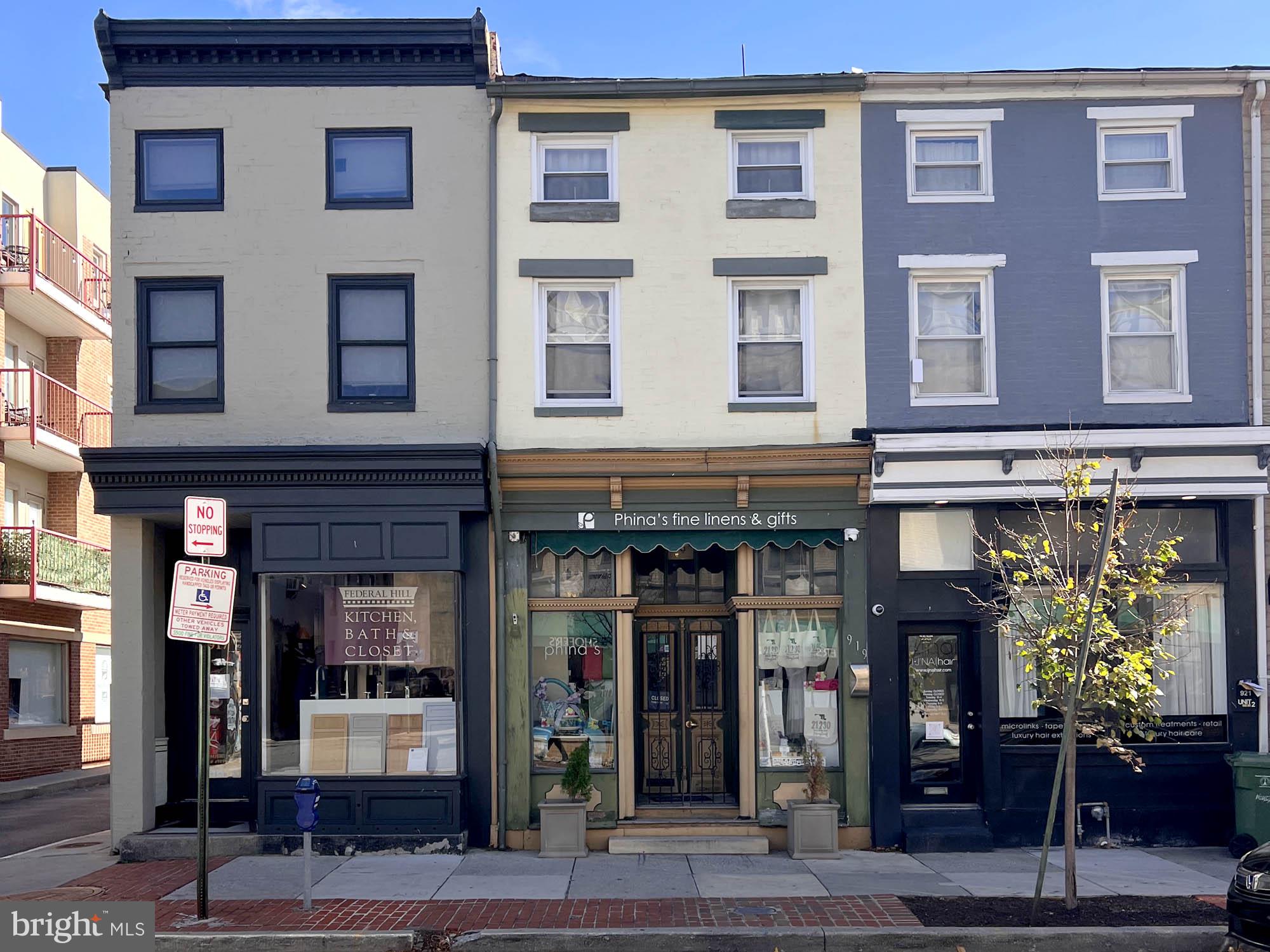REAL ESTATE AUCTION featuring ON SITE and SIMULCAST ONLINE BIDDING!! Online Bidding Opens - Monday, June 8, 2026. Live On Site Auction - Wednesday, June 10, 2026 at 11:00 AM. List price is opening bid only.  Well-located in-line storefront building and apartment in Federal Hill currently rented by Phina���s Fine Linens & Gifts for $3,400/month. The attractive building features a variety of original and updated details, including wood floors (storefront and apartment), granite and marble countertops (apartment), pressed tin ceiling and showcase front window. Situated in the heart of Federal Hill, close to Cross Street Market, M&T Bank Stadium, Federal Hill Park and the Inner Harbor, the property is well positioned in one of Baltimore’s best known historic neighborhoods. The auction provides an opportunity to purchase a property with existing rental revenue in a well-demanded location. The whole building is occupied by Phina’s Fine Linens & Gifts, rented for $3,400/month.