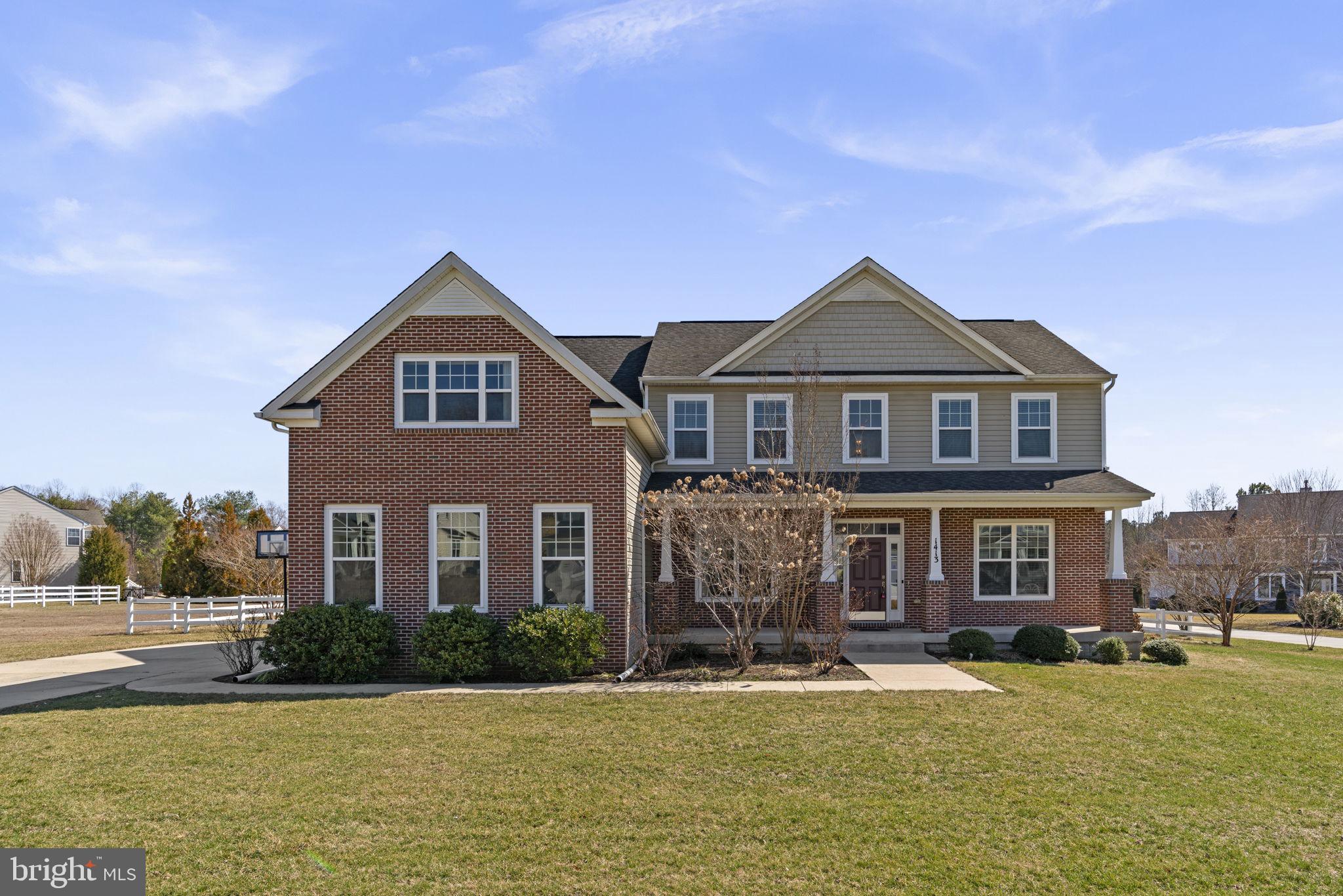 Welcome to 1413 Della Way, a stunning Davidsonville estate situated on a 0.57-acre lot in a top-rated school district, just minutes from downtown. As one of the largest models in the community, this exceptional home offers 4 bedrooms, 5.5 bathrooms, and approximately 4,000 sq ft of refined living space, seamlessly blending elegance, generous space, and modern functionality. The main level boasts a soaring two-story family room with a dramatic fireplace, perfect for entertaining, and a gourmet kitchen equipped with full stainless steel appliances and luxurious marble countertops, flowing effortlessly into a sun-drenched, oversized breakfast area. Upstairs, the primary suite is a private retreat featuring a spacious in-suite bathroom with high-end finishes. Three additional bedrooms share two full bathrooms, providing comfort and convenience for family or guests. The finished basement is expansive, complete with a full bathroom, custom built-in cabinetry, and two versatile rooms ideal for a home theater and fitness center. Step outside to a beautifully landscaped backyard featuring a private tool shed, brick patio, and breathtaking scenic views, perfect for outdoor entertaining or tranquil relaxation. An attached garage with ample parking completes this exquisite residence. Combining luxury, functionality, and convenience, 1413 Della Way represents a rare opportunity to own a sophisticated home with one of the largest floorplans in the community, located in a highly desirable neighborhood with excellent schools and quick access to downtown.