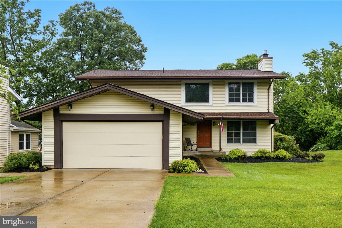 Pride of ownership exudes in this home at every turn. As you approach, you immediately notice the architectural shingle roof and meticulously maintained home. As you enter, you are greeted by hardwood floors, two story foyer and clean line of sight to a beautiful sun room addition. The sun room makes this home larger than similar homes in the neighborhood and provides welcome additional living space. The family room is flanked by a cozy fireplace and leads nicely into the sun room. There is an eat-in dining area adjacent to your updated kitchen. The kitchen has been modernized with newer cabinets, updated counters and stainless appliances. There is a main level laundry room off of your two car garage. The upstairs continues the hardwood floors and features three spacious bedrooms. The primary bedroom has an en-suite bath and is spacious. Two additional bedrooms are supported by a hall bath. There is a beautiful extended deck in the rear that has been freshly painted and improved. The lot is exceptional with mature trees and manicured landscape. Enjoy ease of access to Route 7 and NO HOA in this section of Oak Tree.